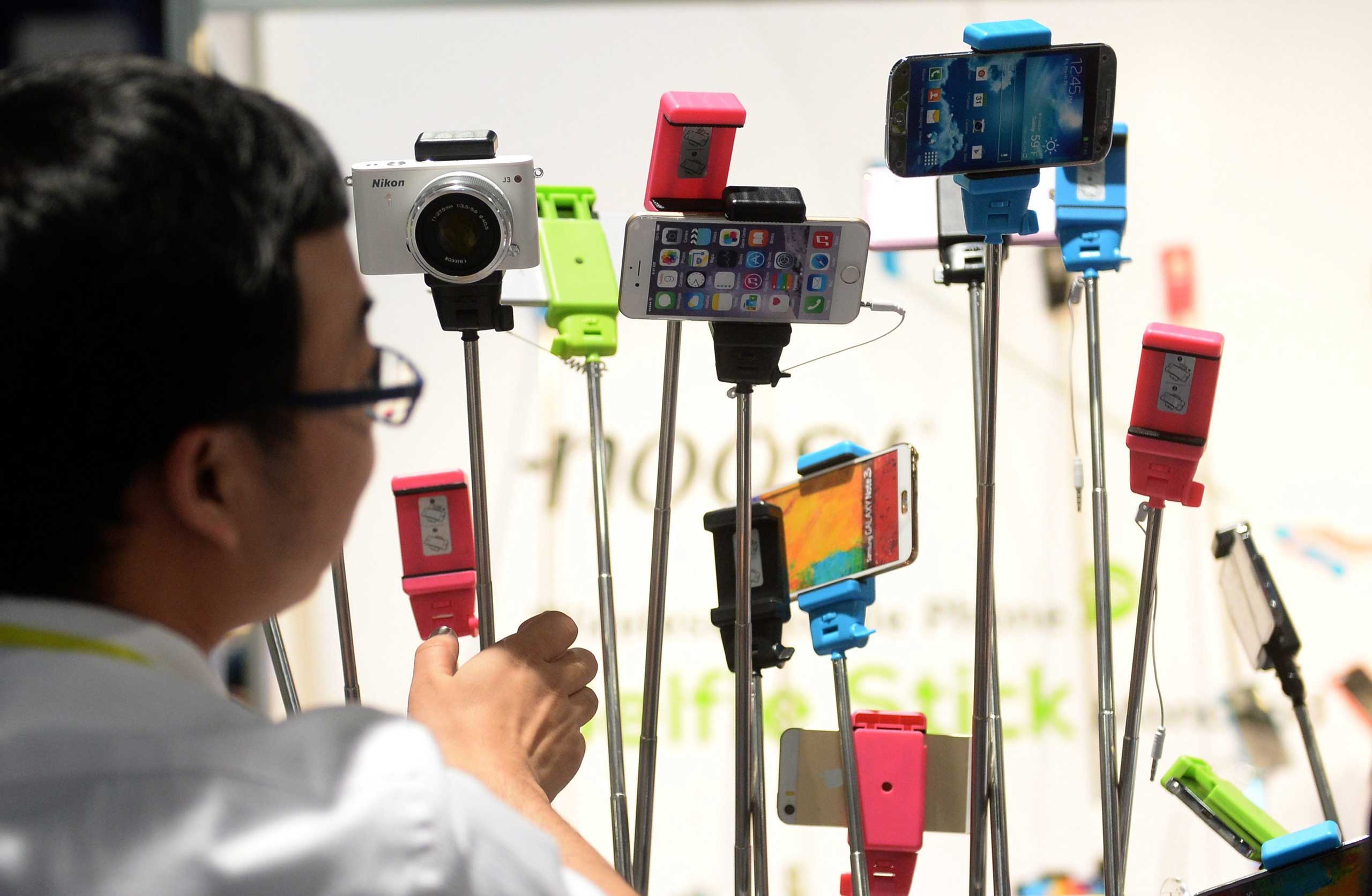 Selfie sticks of the company 'Noosy' displayed on Jan. 8, 2015.