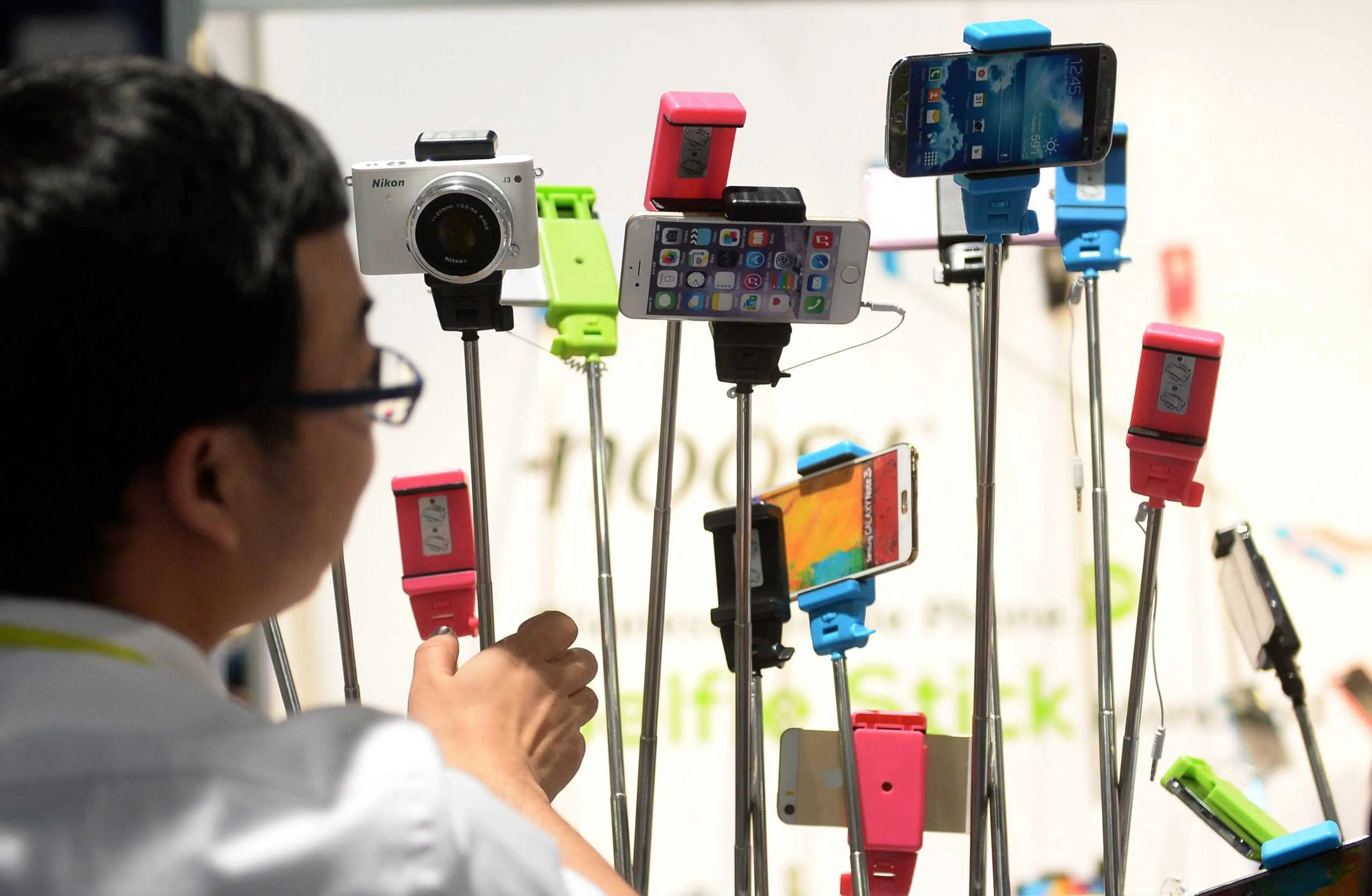 Selfie sticks of the company 'Noosy' displayed on Jan. 8, 2015.