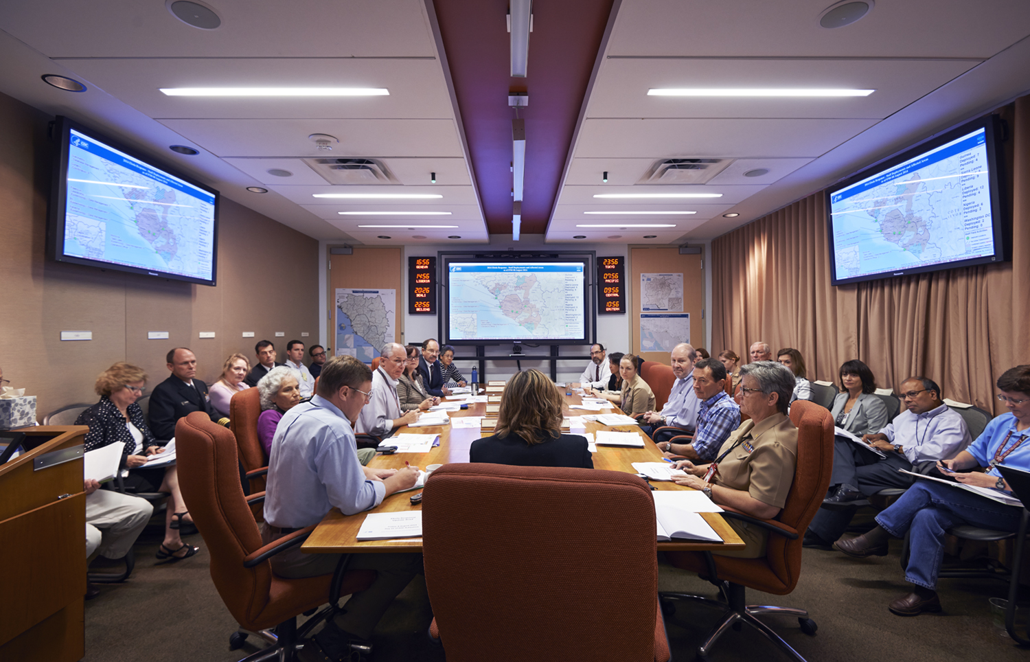 CDC leaders integral to the Ebola response, including epidemiologists, laboratorians, logistics, and more, assemble in agency’s command center to discuss next steps in directing the response at CDC Emergency operations center in Atlanta, August 8.
