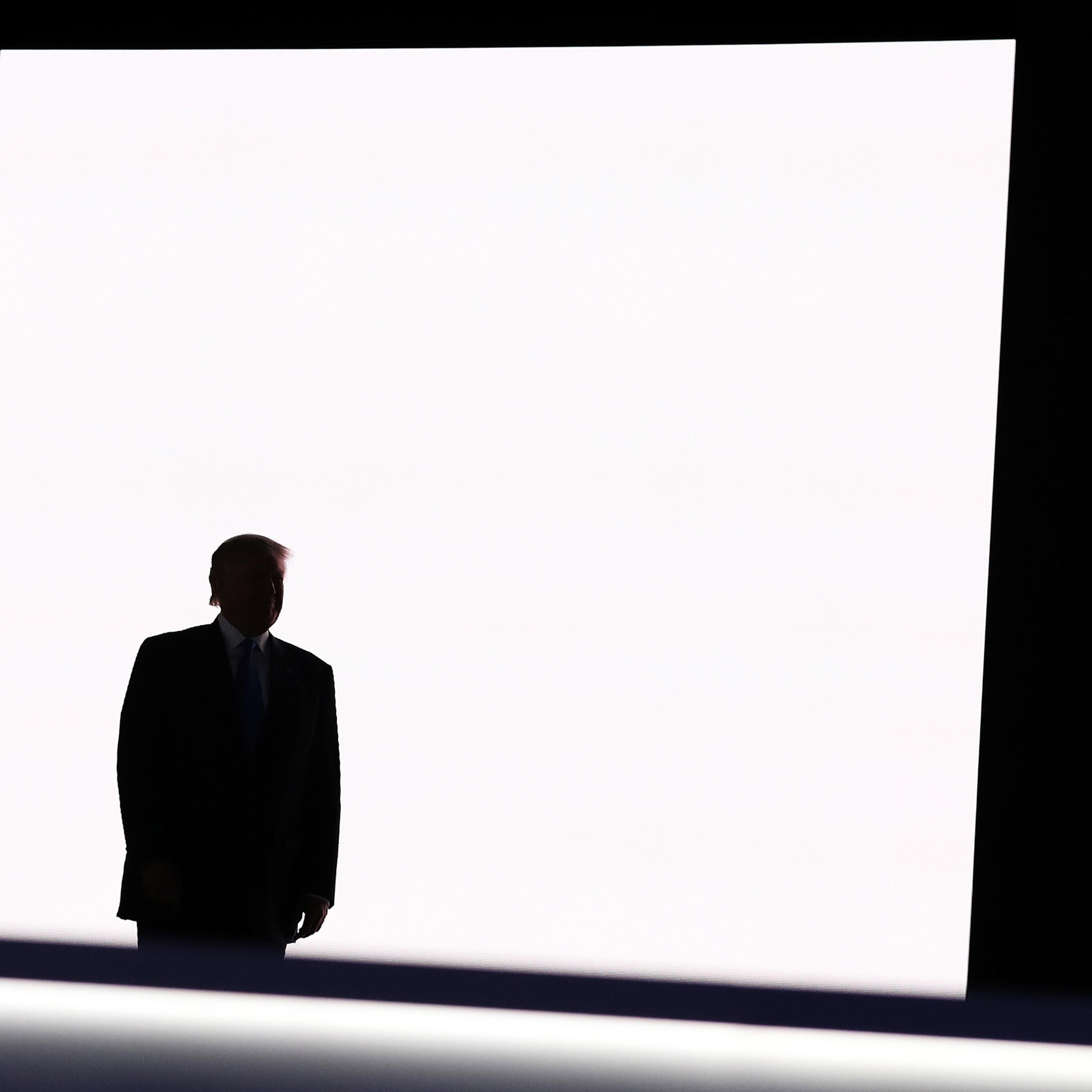 Presumptive Republican presidential nominee Donald Trump walks on stage to introduce his wife Melania on the first day of the Republican National Convention at the Quicken Loans Arena in Cleveland on July 18, 2016.