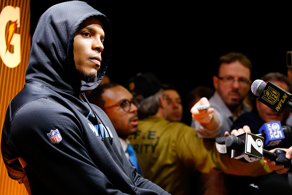 Cam Newton #1 of the Carolina Panthers reacts during his postgame press conference after the Denver Broncos defeated the Carolina Panthers with a score of 24 to 10 to win Super Bowl 50 at Levi's Stadium in Santa Clara, Calif., on Feb. 7, 2016.