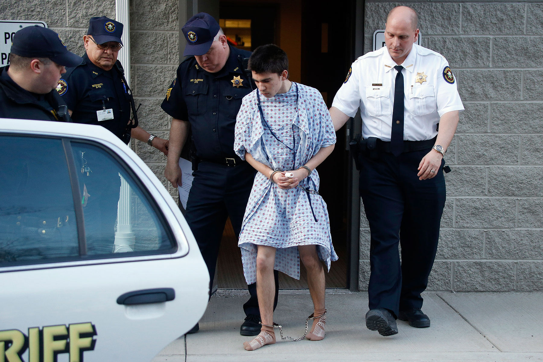 Alex Hribal, the suspect in the stabbings at the Franklin Regional High School near Pittsburgh, is taken from a district magistrate after he was arraigned on charges in the attack on April 9, 2014 in Export, Pa.