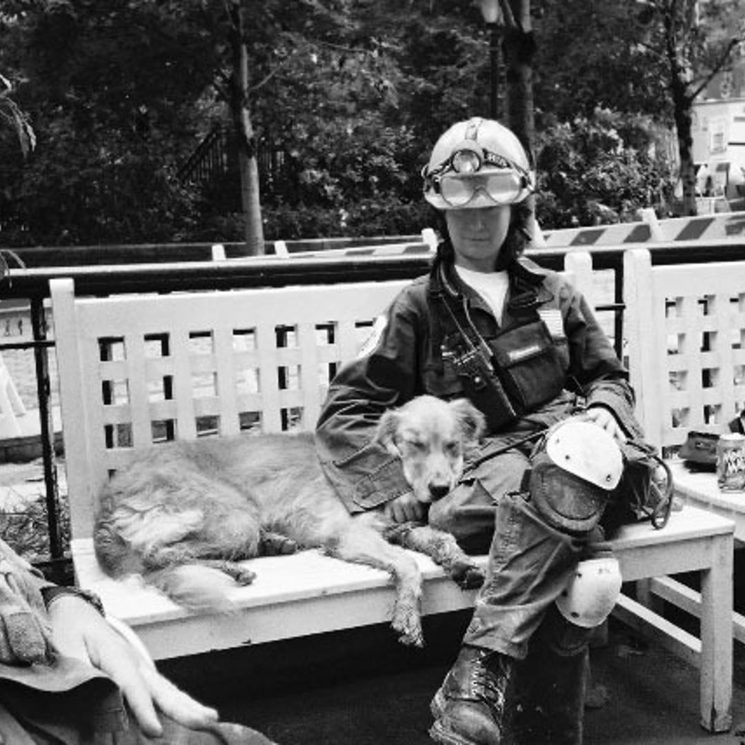 Collect picture of Bretagne taking a nap with Deniese while working at 9/11 site.Almost three thousand people died in the attacks of 9/11 and in the immediate days that followed nearly 100 search and rescue dogs and their owners scoured Ground Zero for s