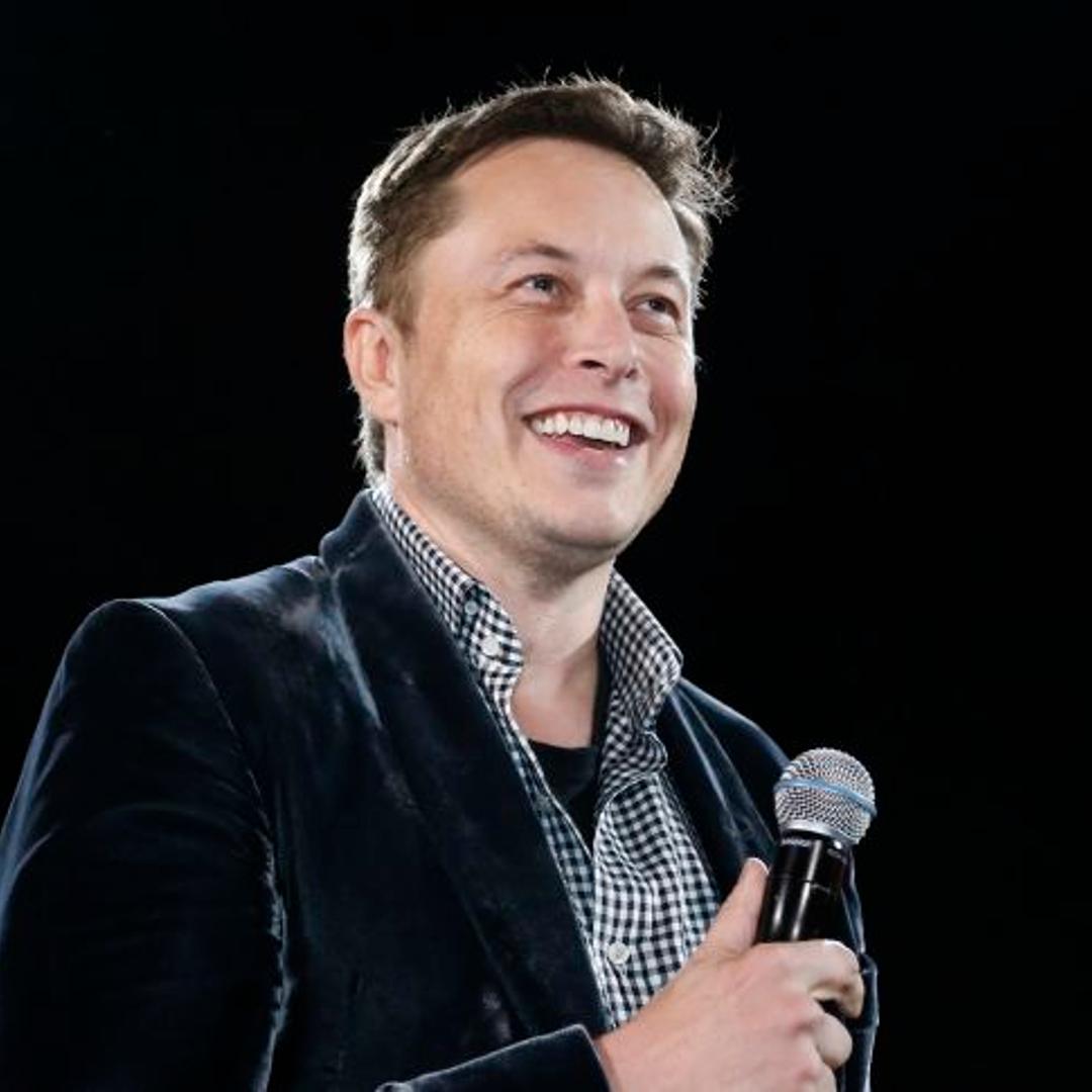 Tesla Motors Inc CEO Elon Musk unveils a new all-wheel-drive version of the Model S car in Hawthorne, California