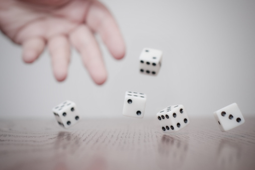 hand-throwing-dice