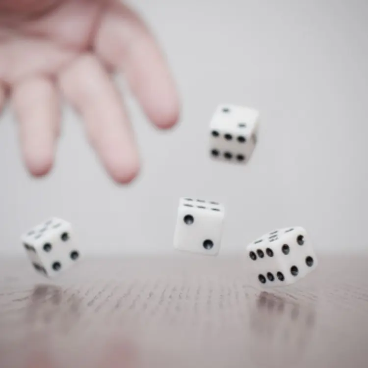 hand-throwing-dice