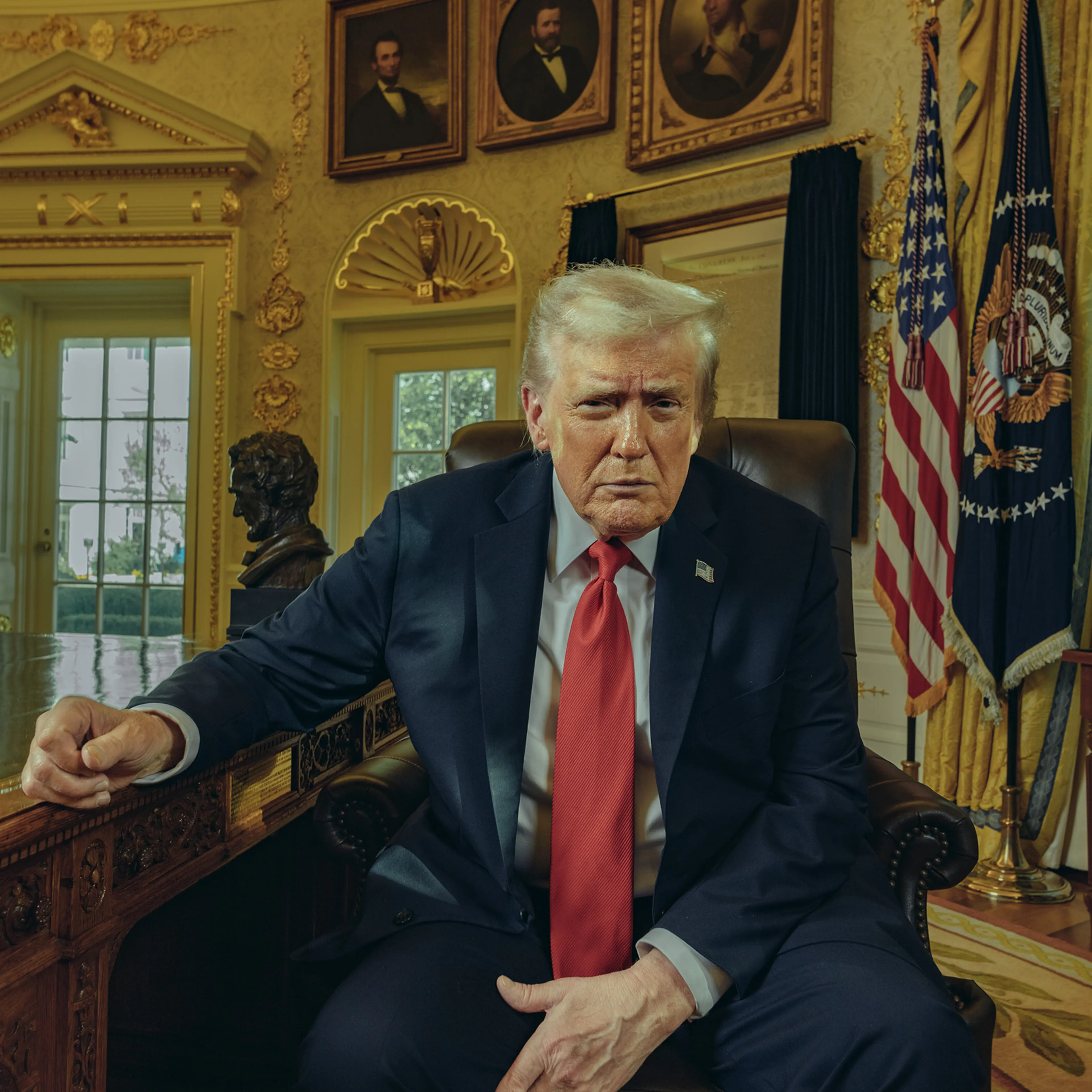 President Donald Trump sits at the Resolute desk in the Oval Office at the White House, in Washington, DC, on Oct. 21, 2025.