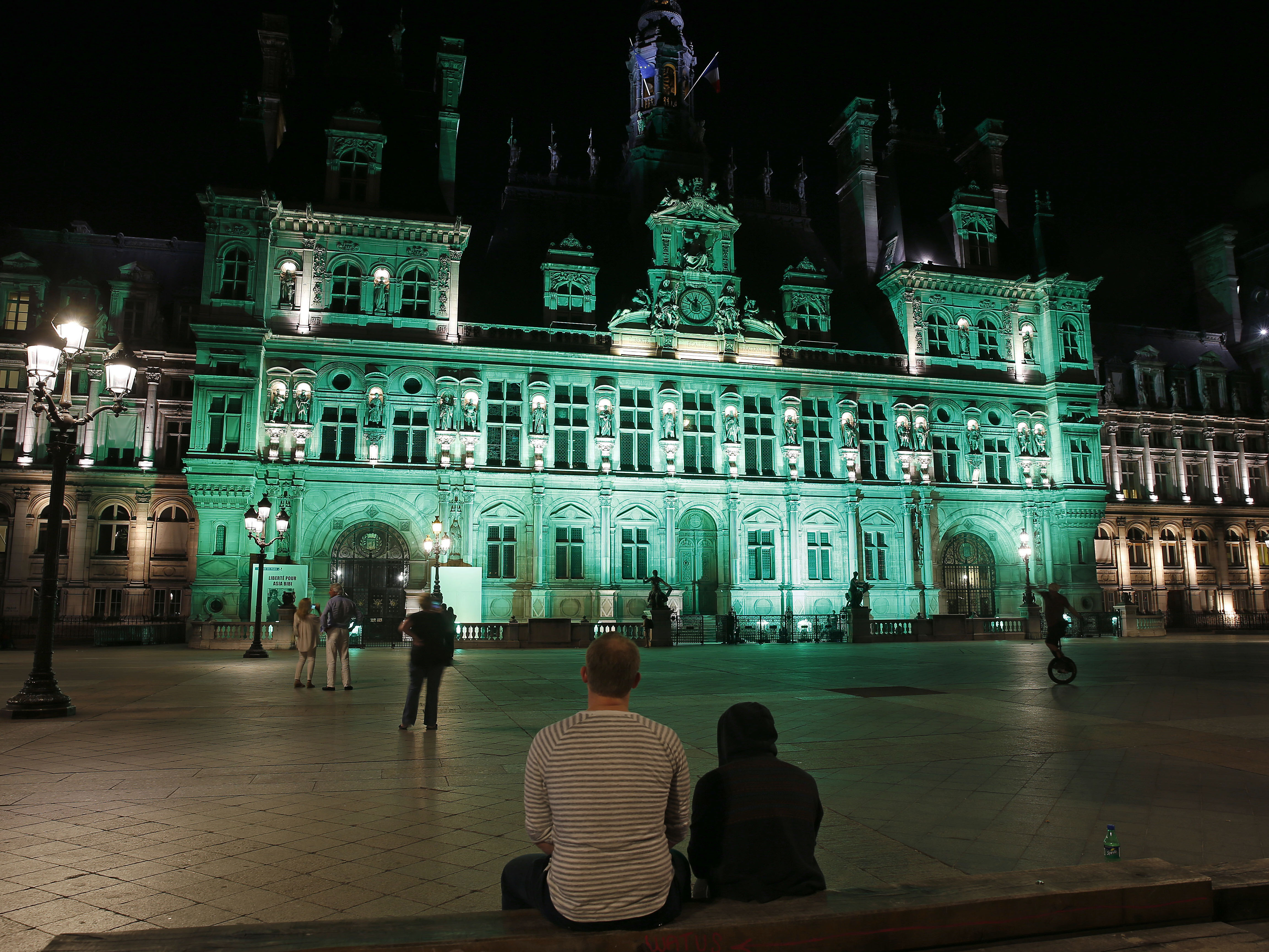 Paris City Hall Lights Up In Green To Protest Donald Trump's Decision To Pull USA out Of Paris Climate Accord