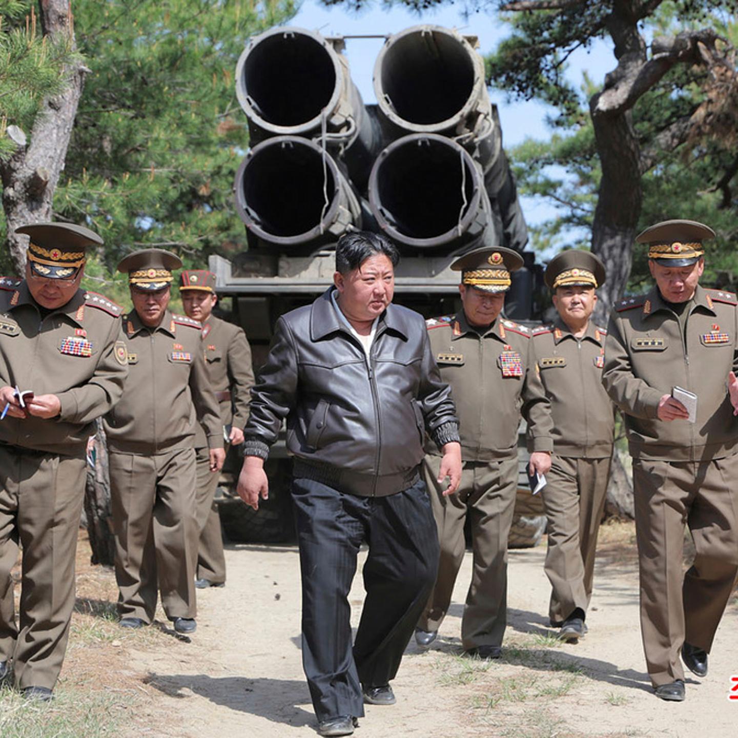 In this photo provided by the North Korean government, North Korean leader Kim Jong Un, center, supervises a drill of long-range artillery and missile systems at North Korea’s eastern coast on May 8, 2025.