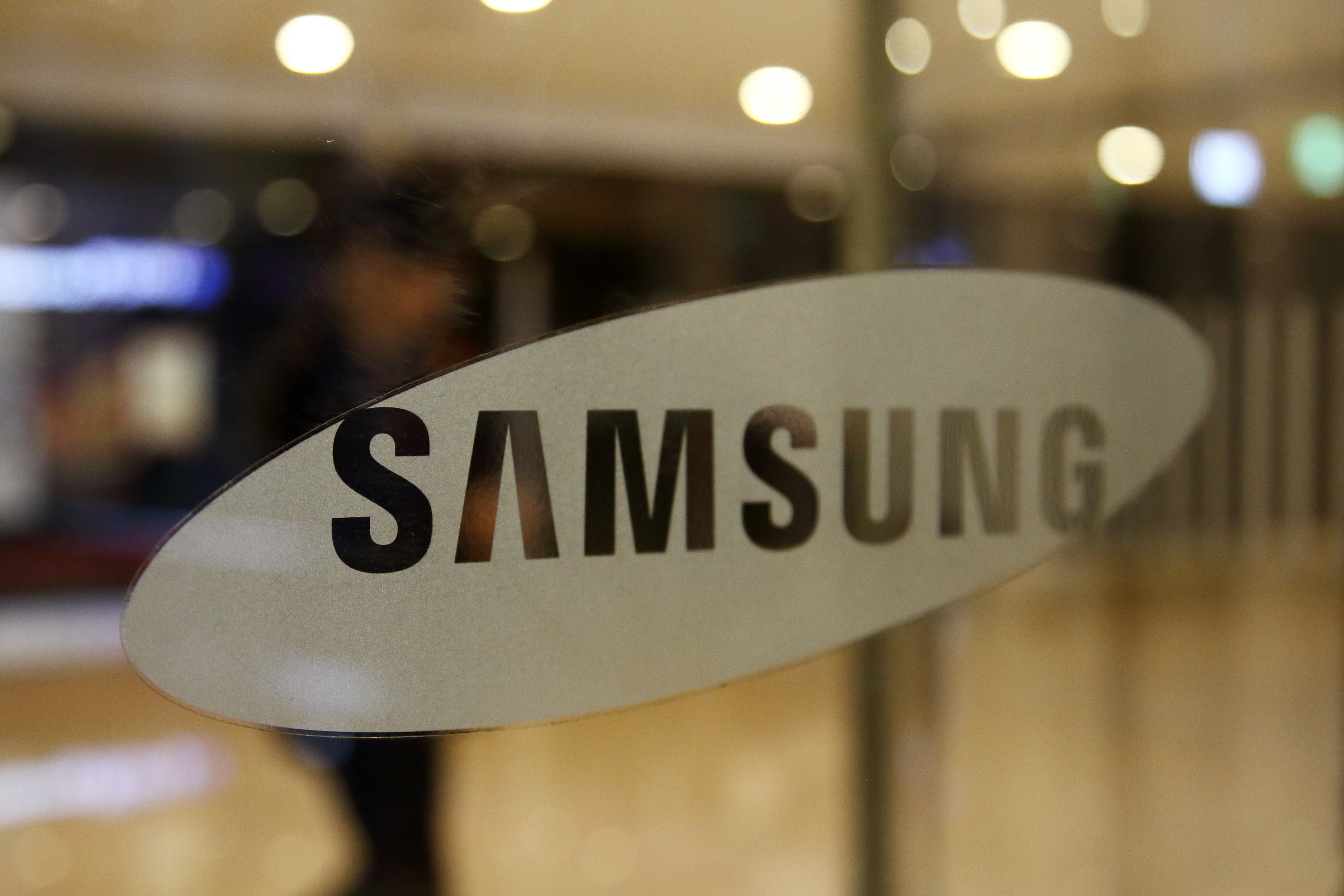 The Samsung Electronics Co. logo is displayed at the company's Seocho office building in Seoul, South Korea, on Thursday, Oct. 27, 2016.
