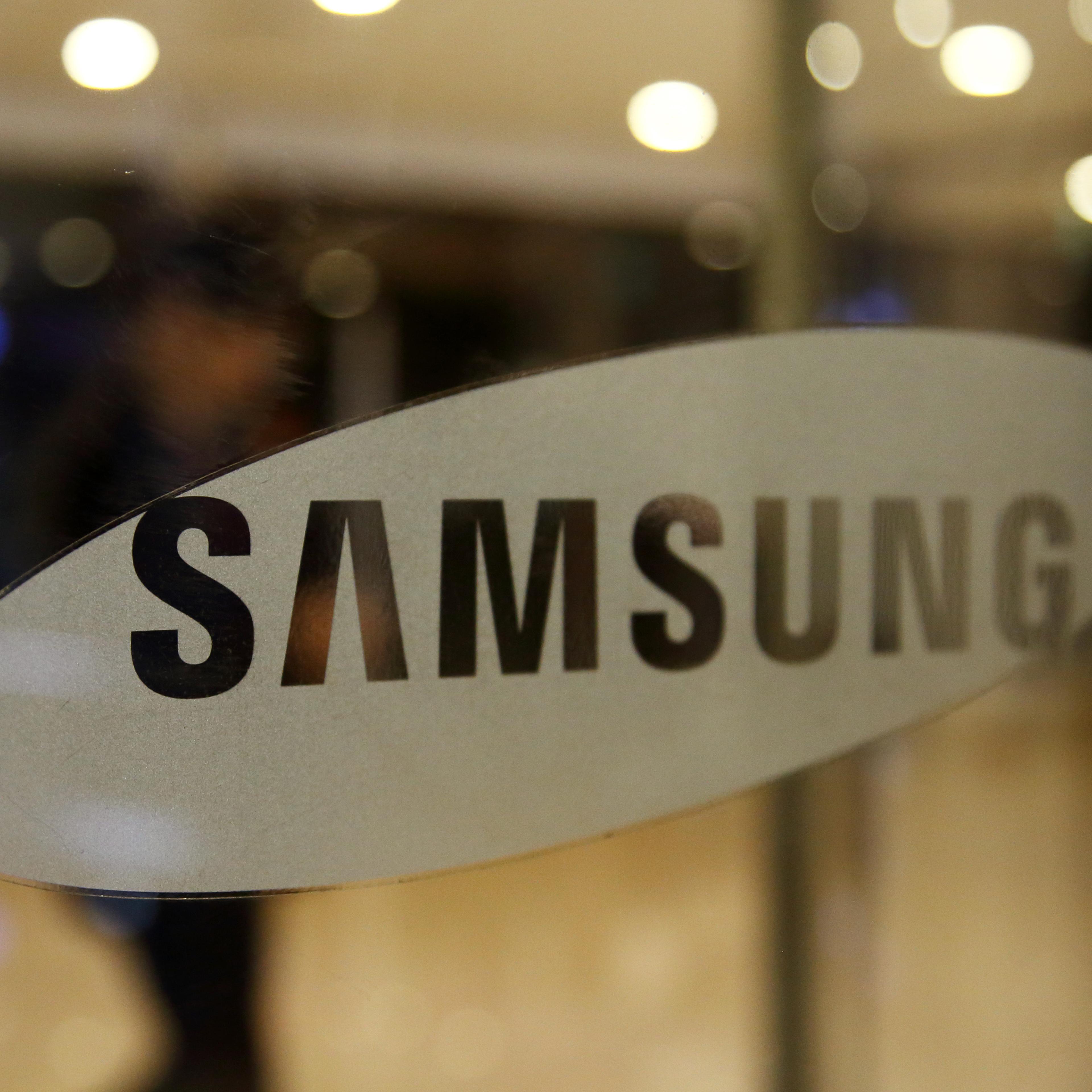 The Samsung Electronics Co. logo is displayed at the company's Seocho office building in Seoul, South Korea, on Thursday, Oct. 27, 2016.