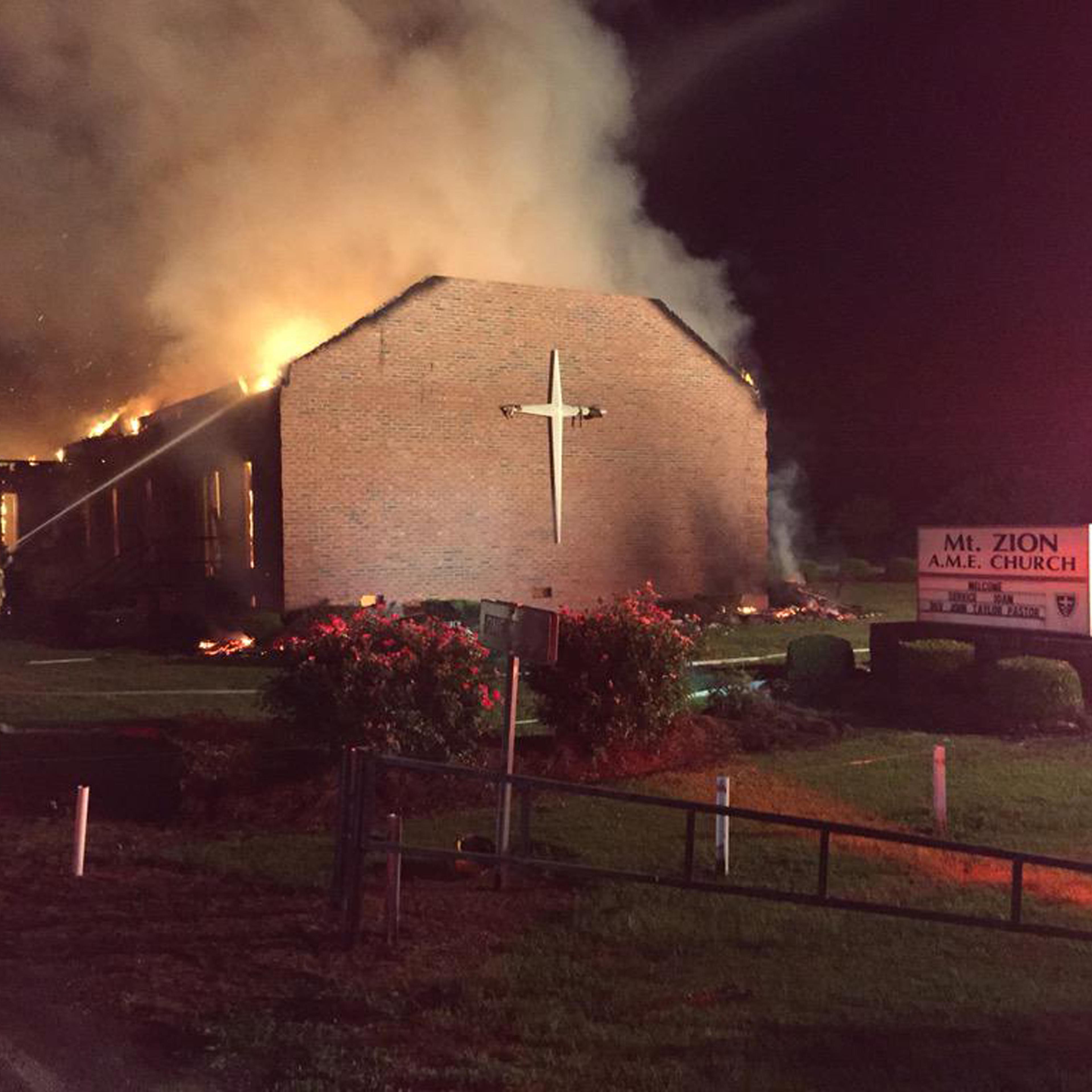 Fire crews try to control a blaze at the Mt. Zion African Methodist Episcopal Church in Greeleyville, South Carolina in this handout photo