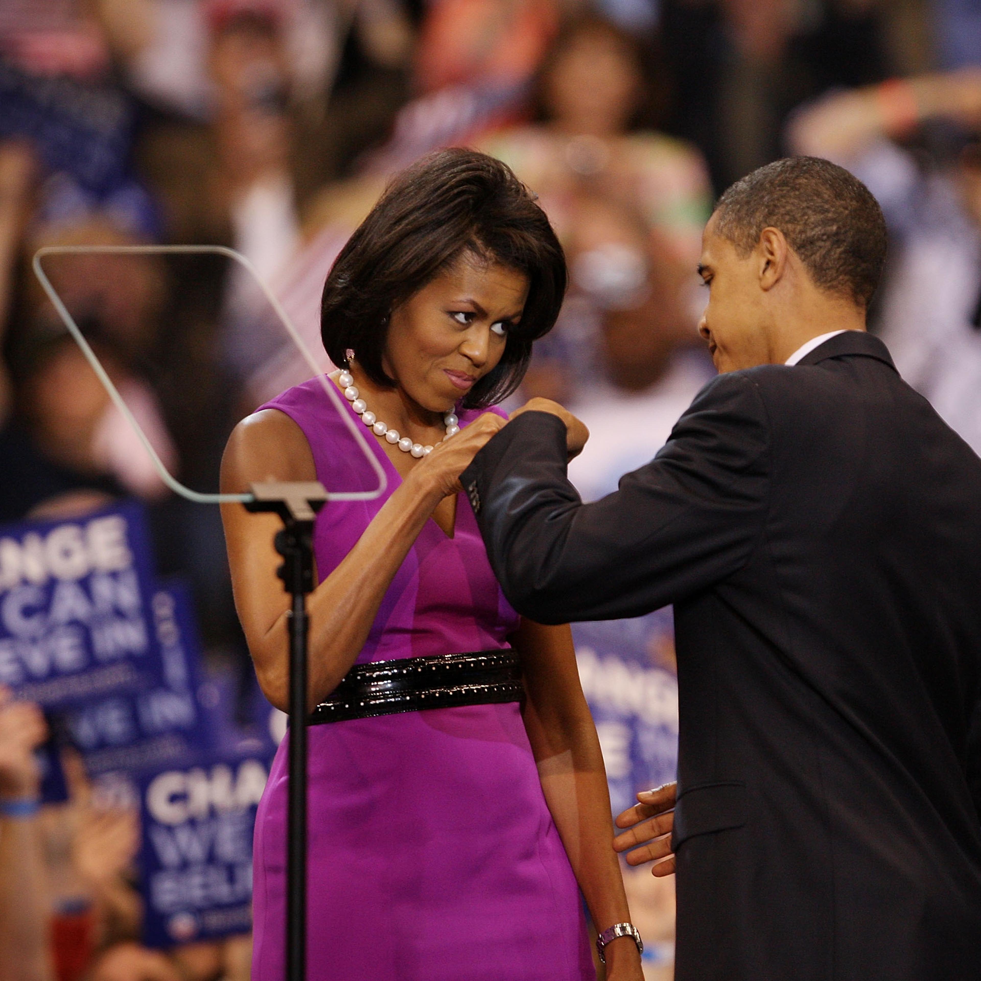 From right: U.S. President Barack Obama and First Lady Michelle Obama bump fists at an election night rally at the Xcel Energy Center on June 3, 2008 in St. Paul, Minn. during his first presidential campaign.