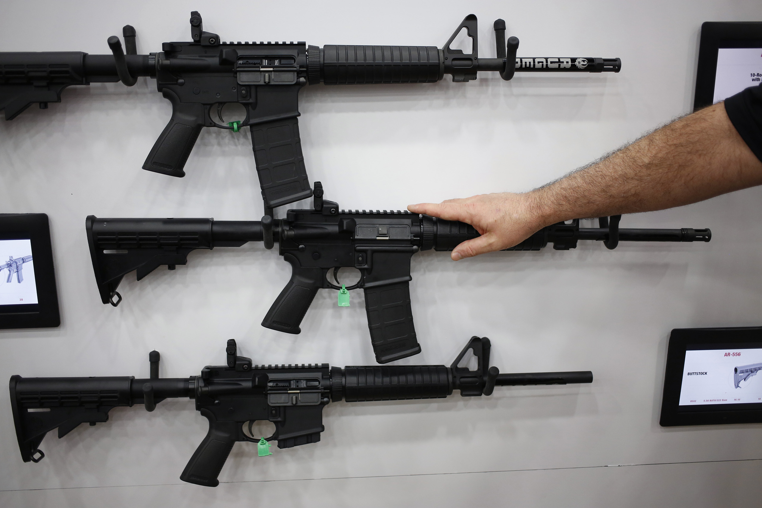 AR-15 rifles are displayed on the exhibit floor during the National Rifle Association (NRA) annual meeting in Louisville on May 20, 2016.