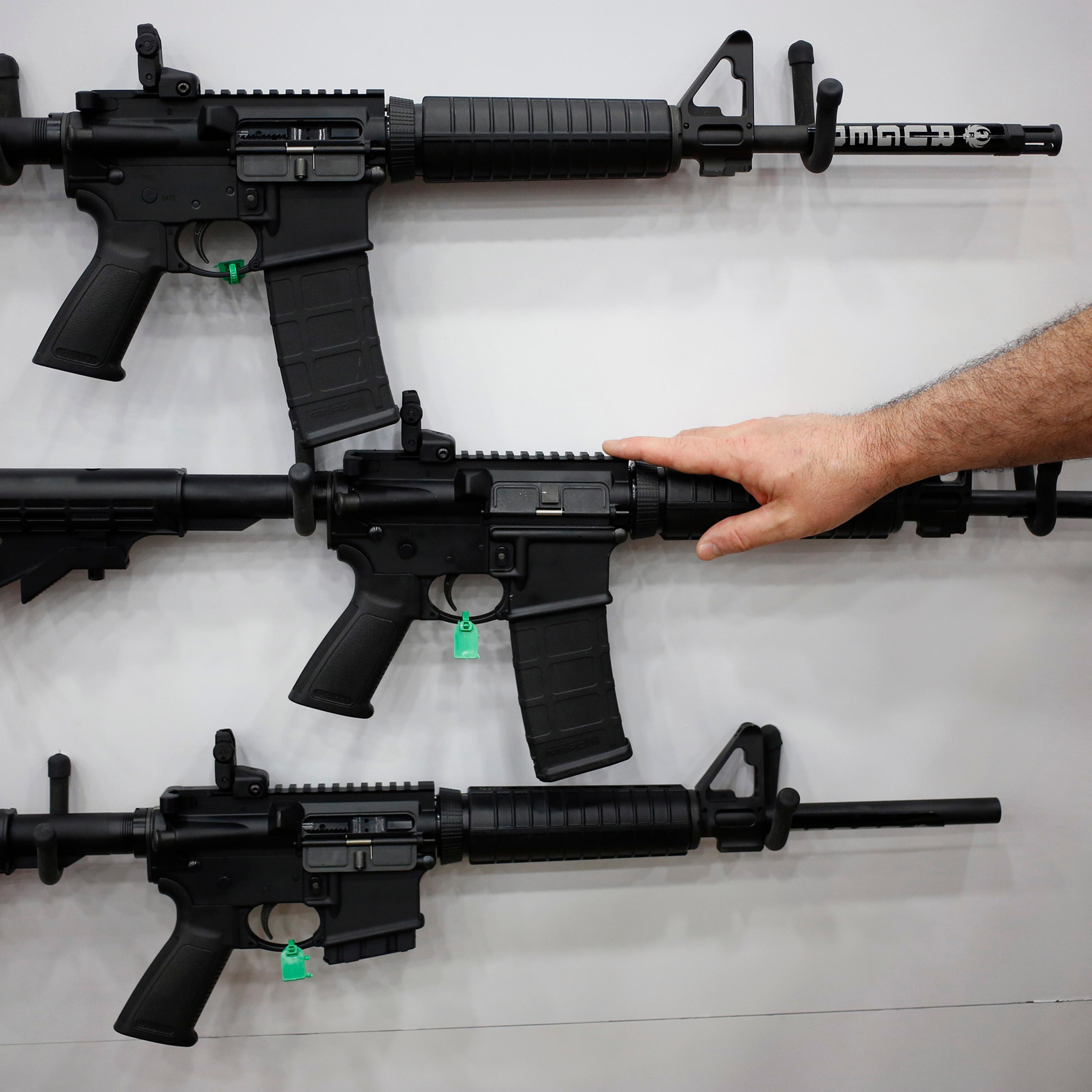AR-15 rifles are displayed on the exhibit floor during the National Rifle Association (NRA) annual meeting in Louisville on May 20, 2016.