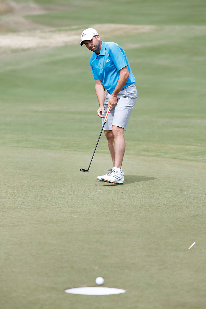 PGA Tour golfer Sergio Garcia putts during TaylorMade's 15-inch-cup event at the Oconee Golf Club at Reynolds Plantation on Monday, April 14, 2014 in Greensboro, Ga.