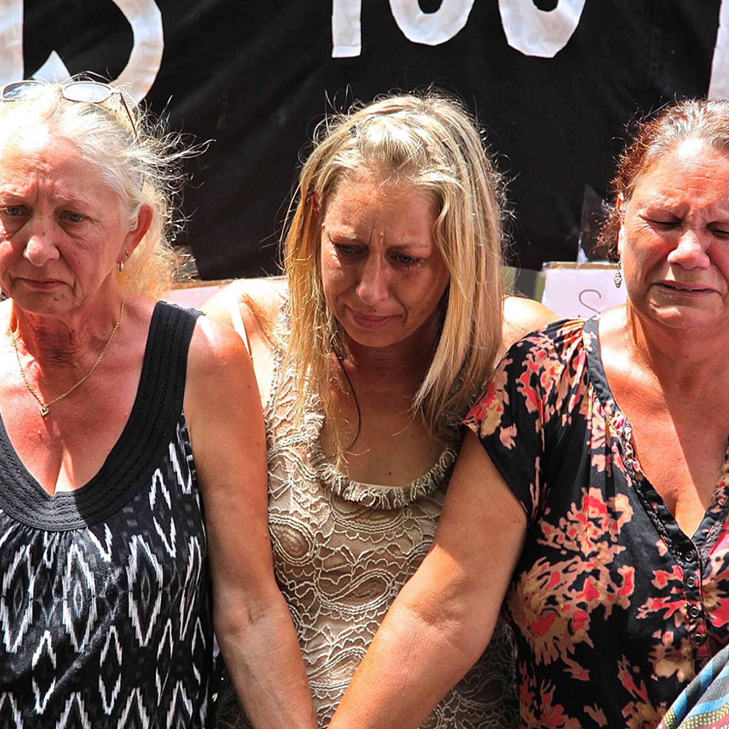 Members of Grandmothers Against Removals protesting against the overrepresentation of indigenous children in the child-protection system on the steps of the Parliament House of New South Wales in Sydney on Feb. 13, 2014