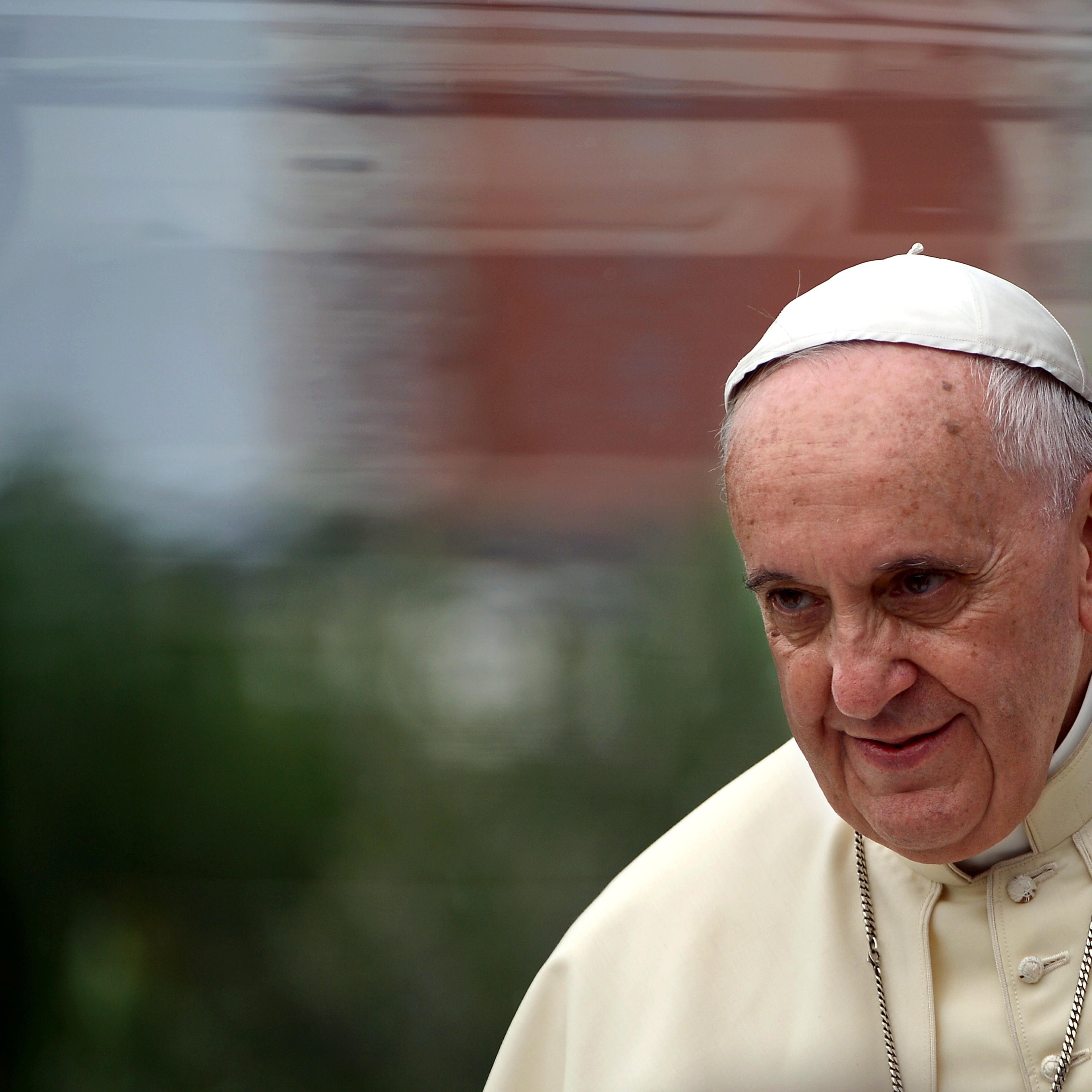 Pope Francis arrives with his popemobile at the Catholic University in Tirana, on September 21, 2014.