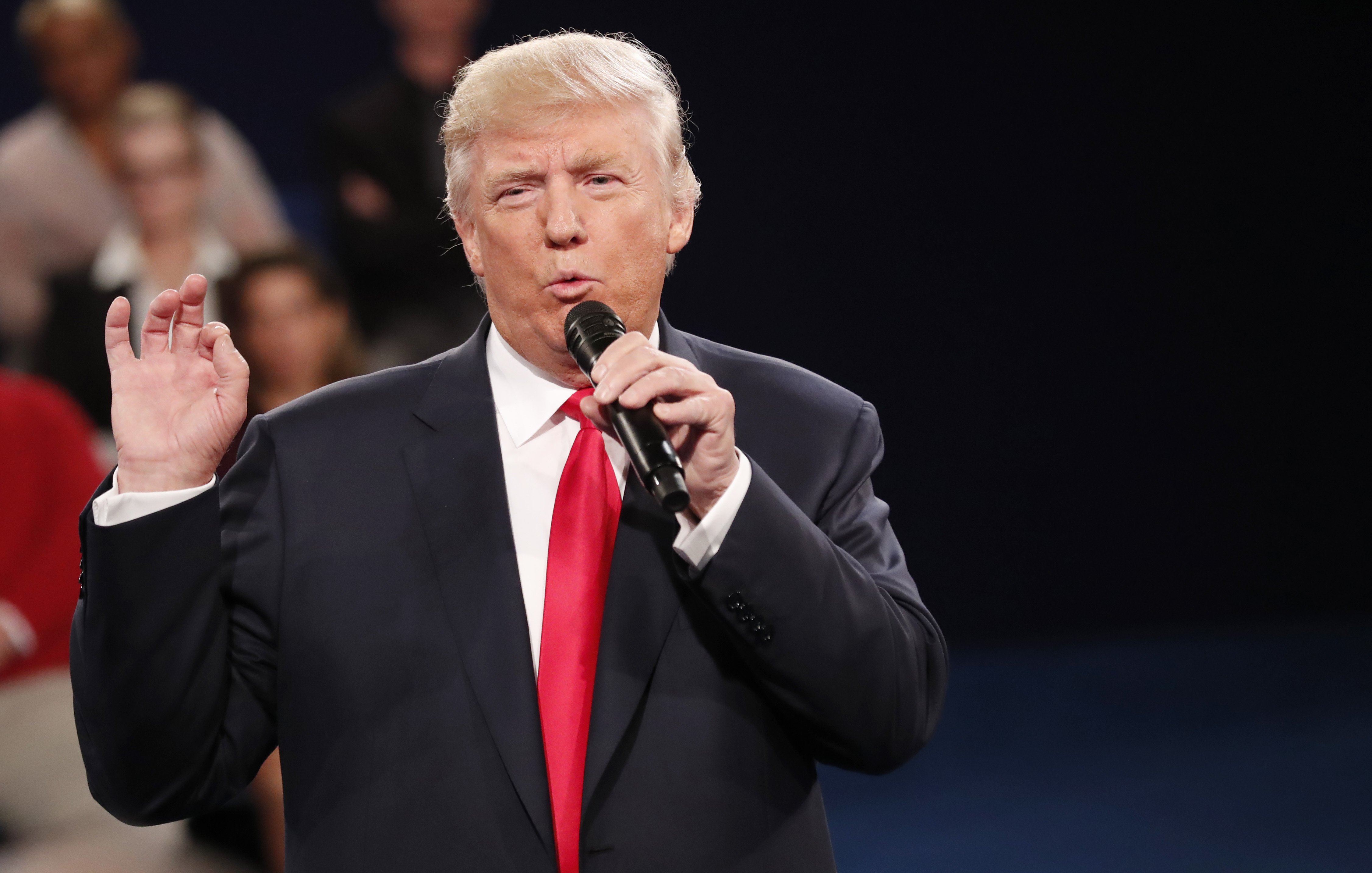 Republican Presidential nominee Donald Trump participates in a town hall debate at Washington University in St. Louis on Oct. 9, 2016.