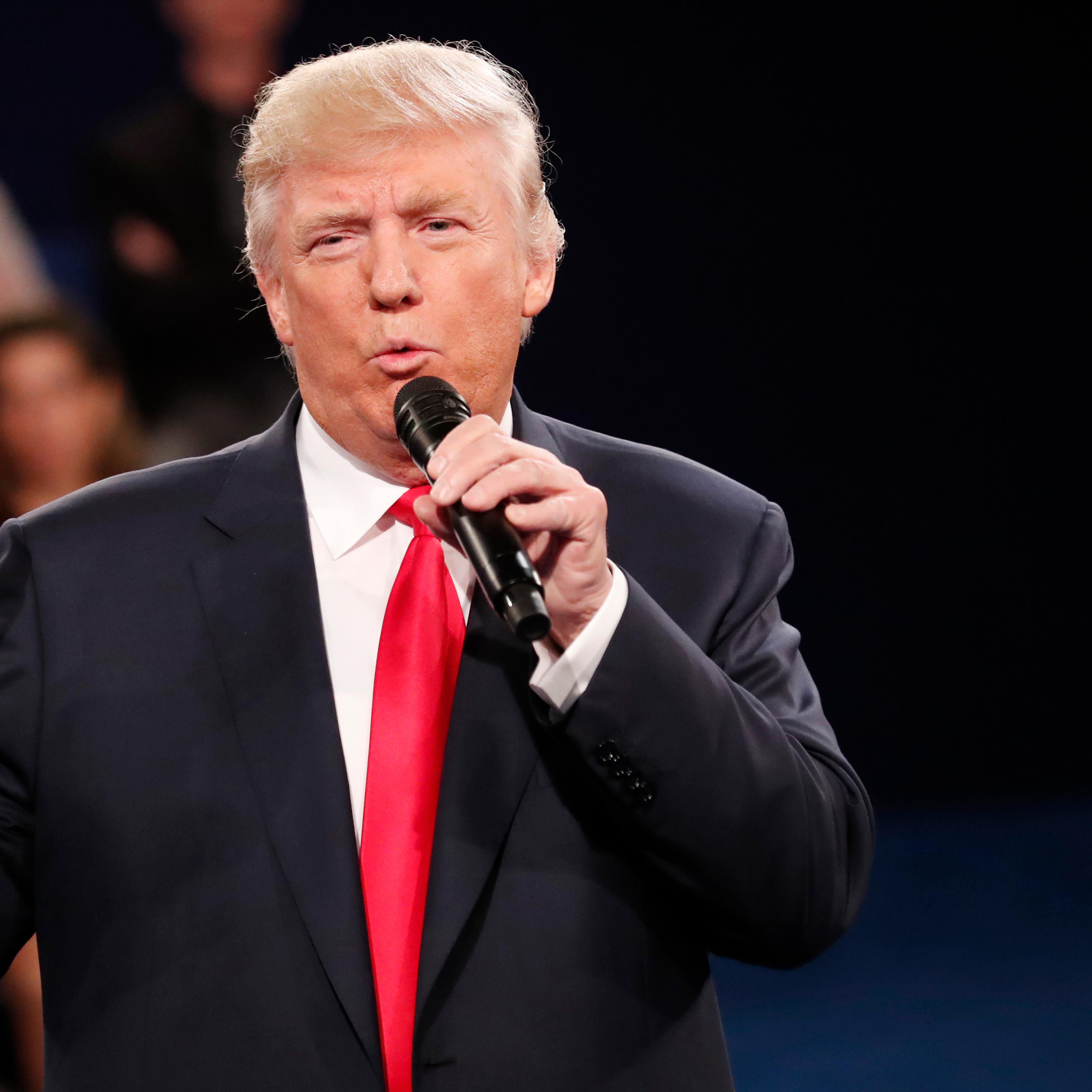 Republican Presidential nominee Donald Trump participates in a town hall debate at Washington University in St. Louis on Oct. 9, 2016.