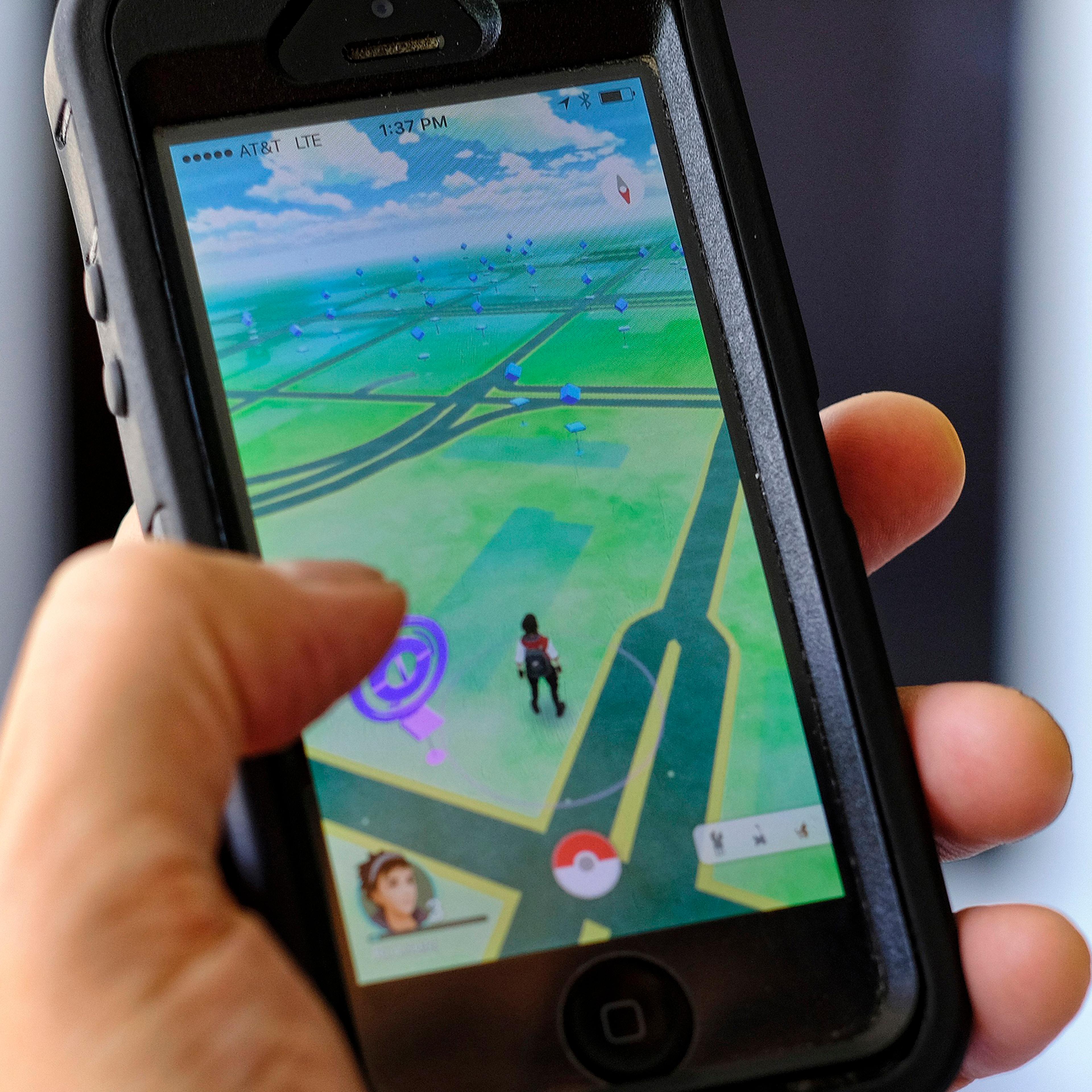 Pokemon Go is displayed on a cell phone in Los Angeles, July 8, 2016.