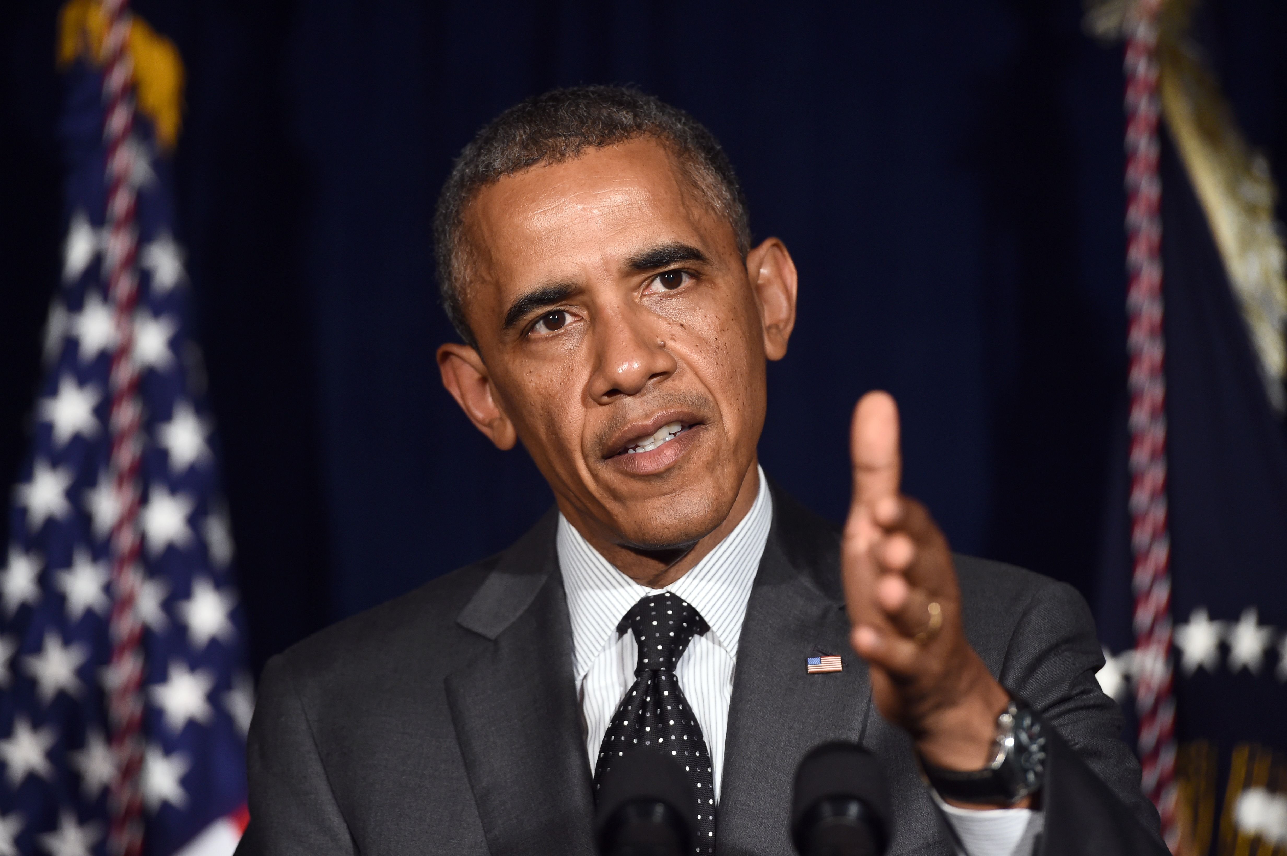 US President Barack Obama delivers a statement on the urgent humanitarian situation following his meeting with local elected officials and faith leaders on July 8, 2014 in Dallas, Texas.