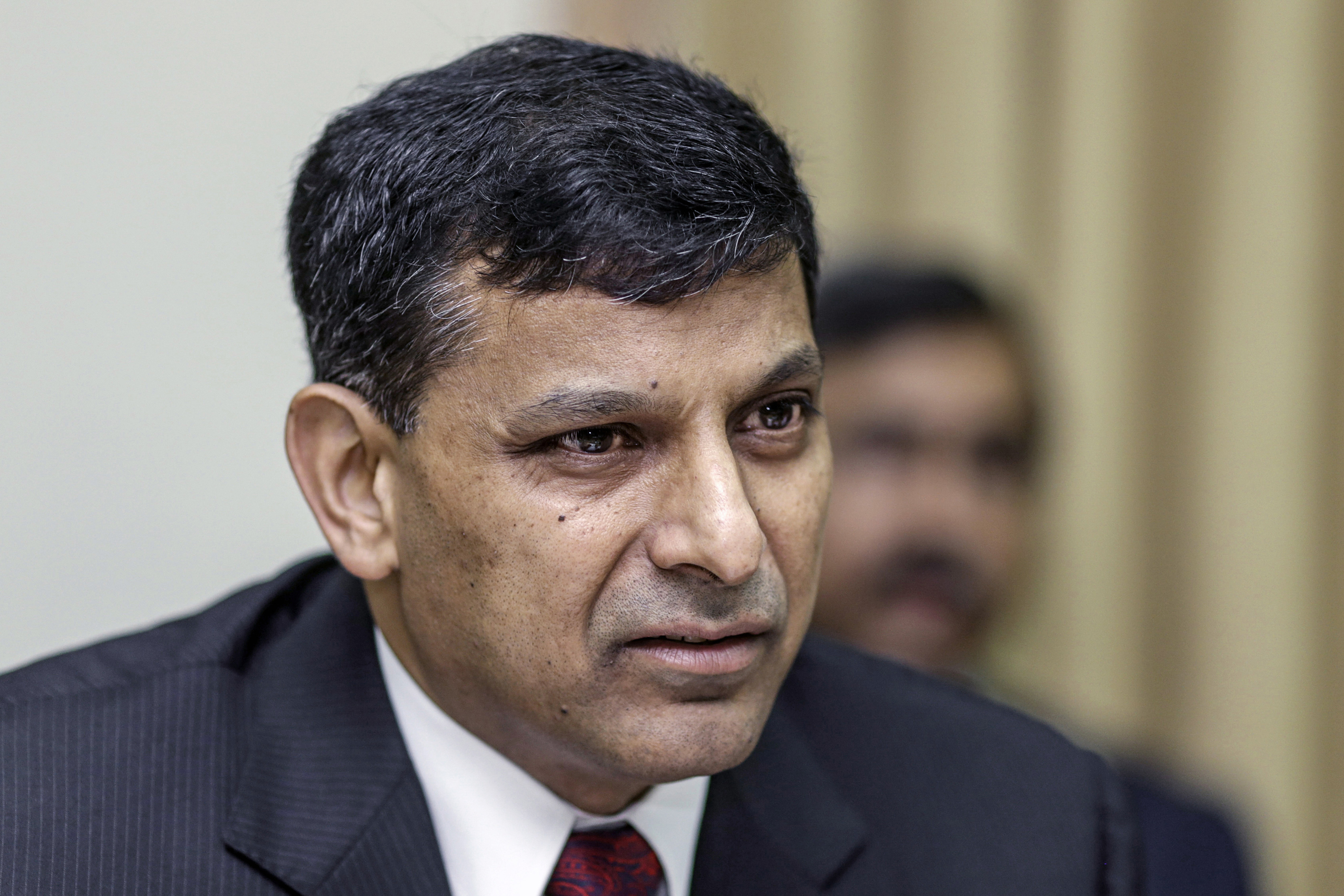Reserve Bank of India Governor Rajan Unveils Interest-Rate Decision And Images Of Market Reactions
