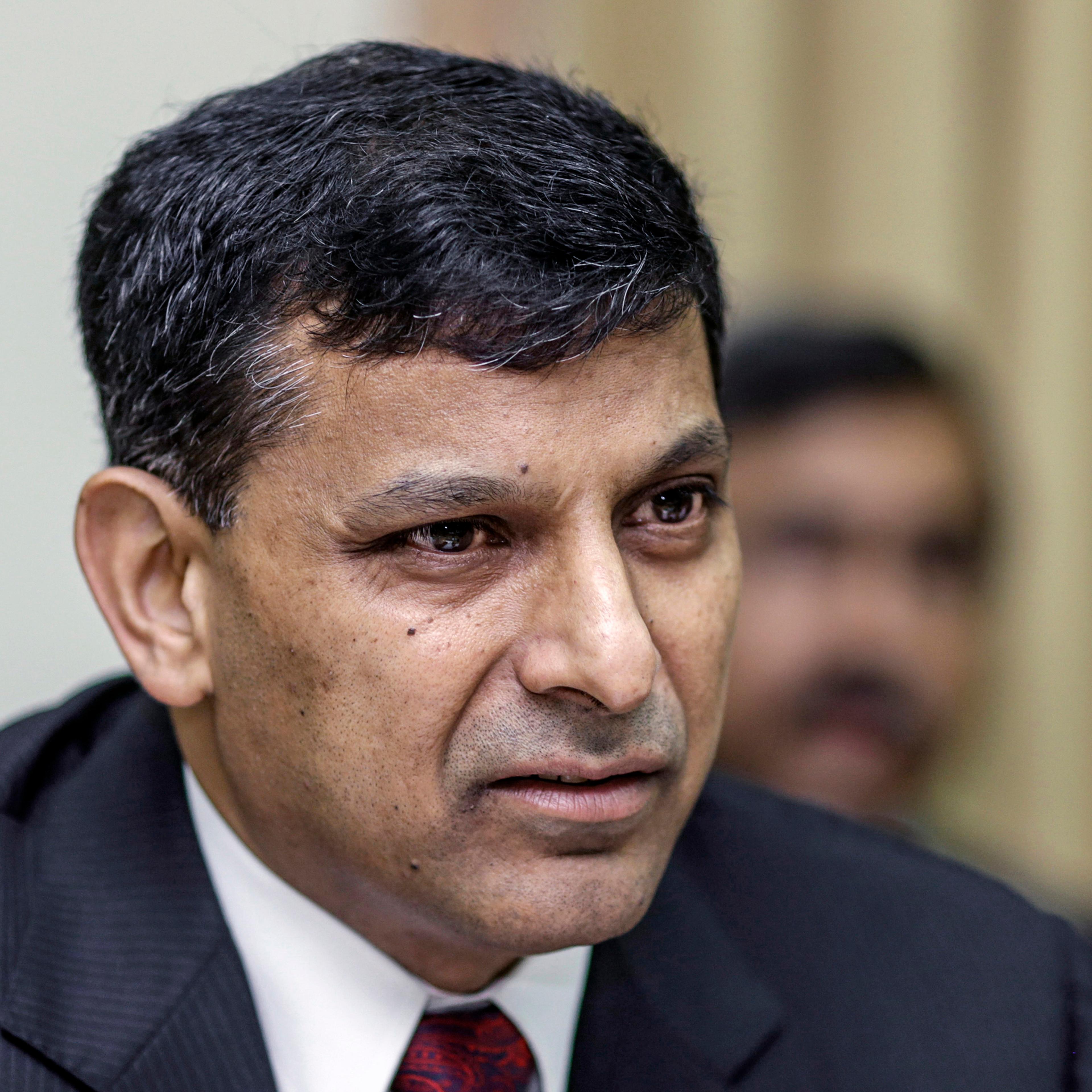 Reserve Bank of India Governor Rajan Unveils Interest-Rate Decision And Images Of Market Reactions
