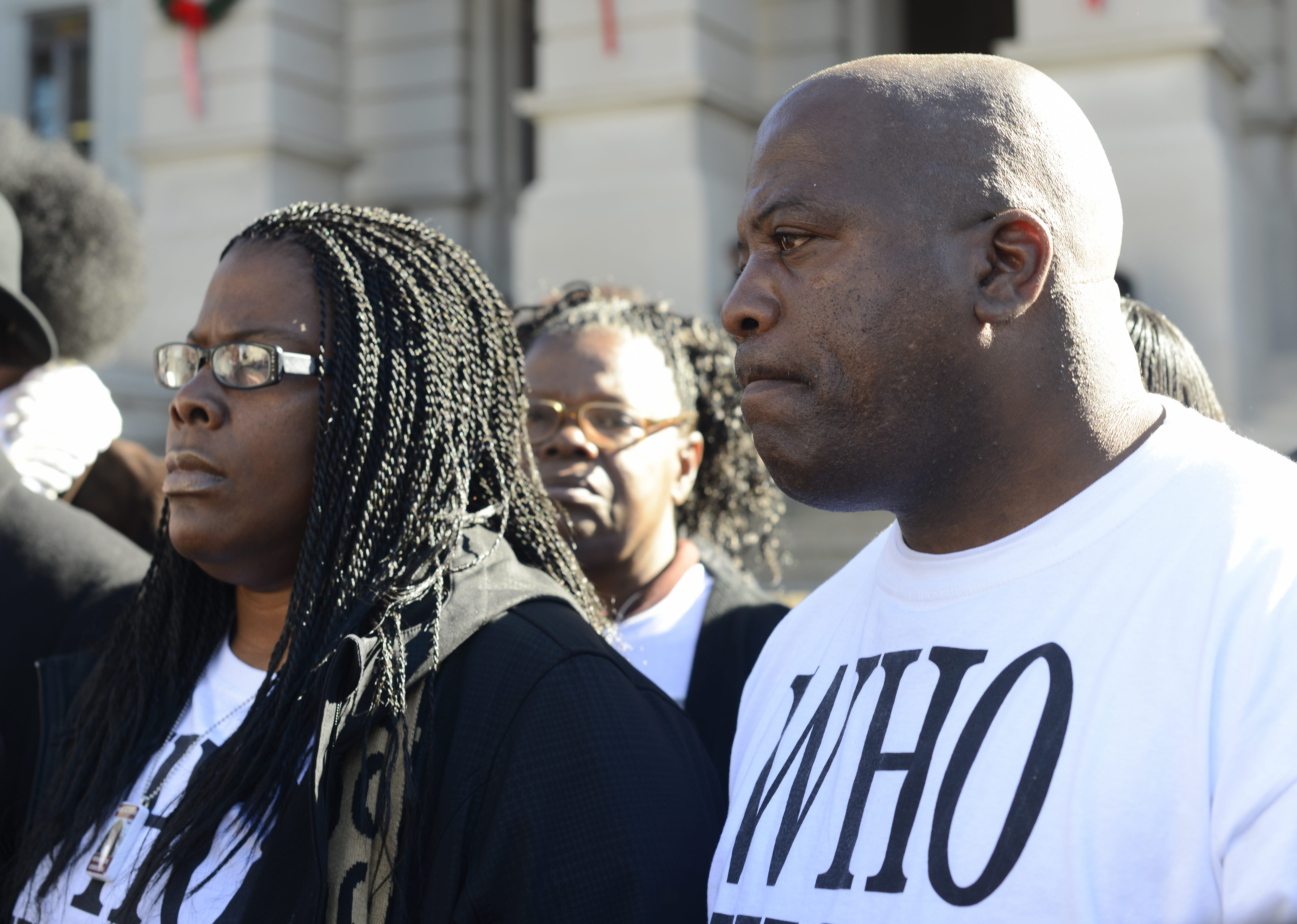 Jacqueline Johnson (left) and her husband Kenneth (right) participate in a rally on behalf of their dead son Kendrick Johnson at the Georgia State Capitol in Atlanta on Dec. 11, 2013.