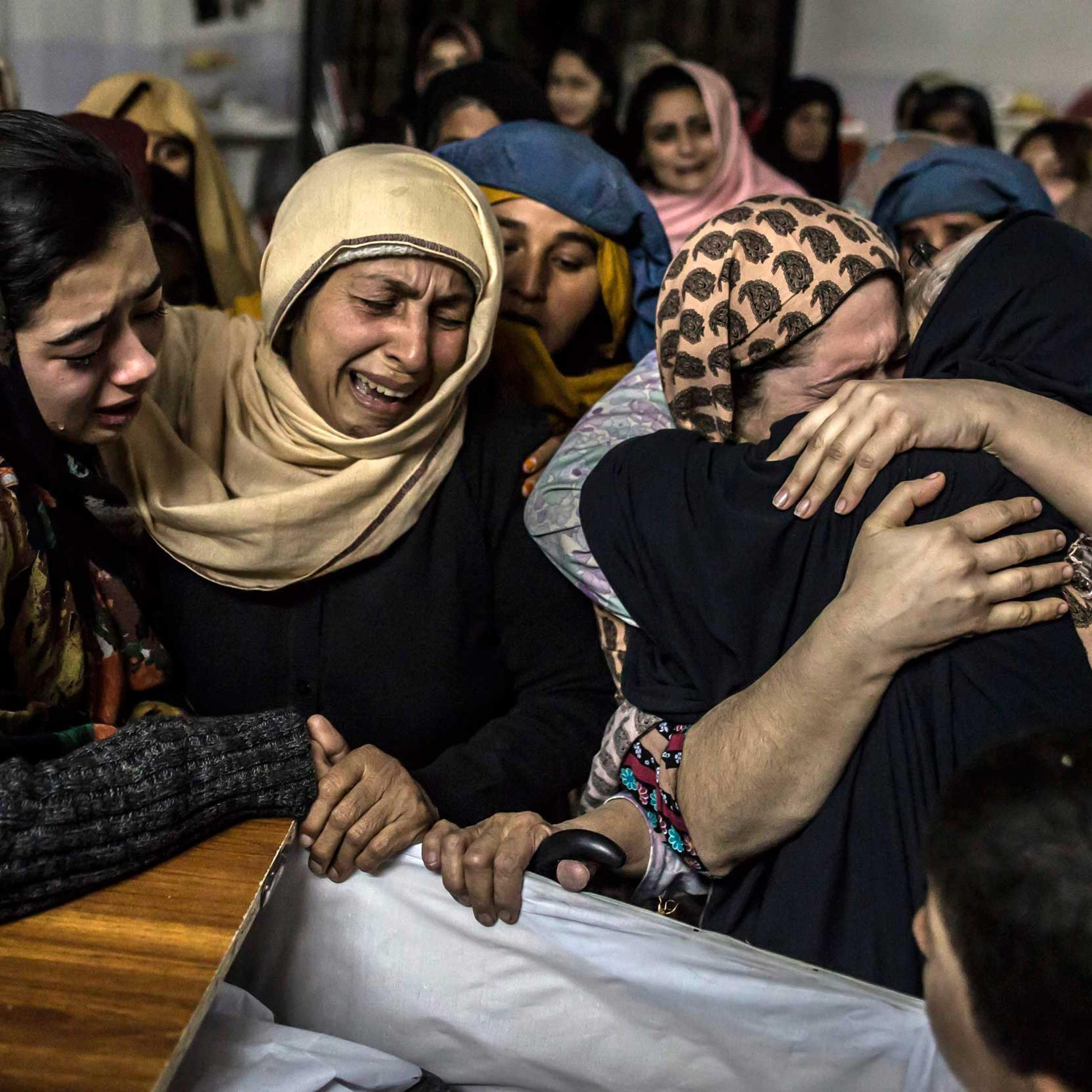 Women mourn their relative Mohammed Ali Khan, 15, a student who was killed during an attack by Pakistani Taliban gunmen on the Army Public School, at his house in Peshawar in 2014.