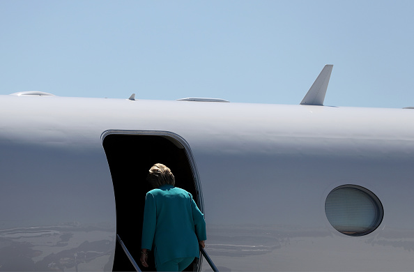 Democratic presidential nominee former Secretary of State Hillary Clinton gets onto her plane at Reno Tahoe International Airport on August 25, 2016 in Reno, Nevada.