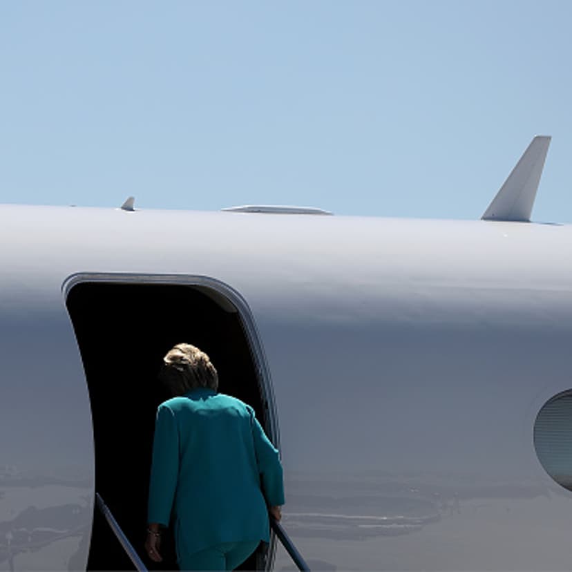 Democratic presidential nominee former Secretary of State Hillary Clinton gets onto her plane at Reno Tahoe International Airport on August 25, 2016 in Reno, Nevada.
