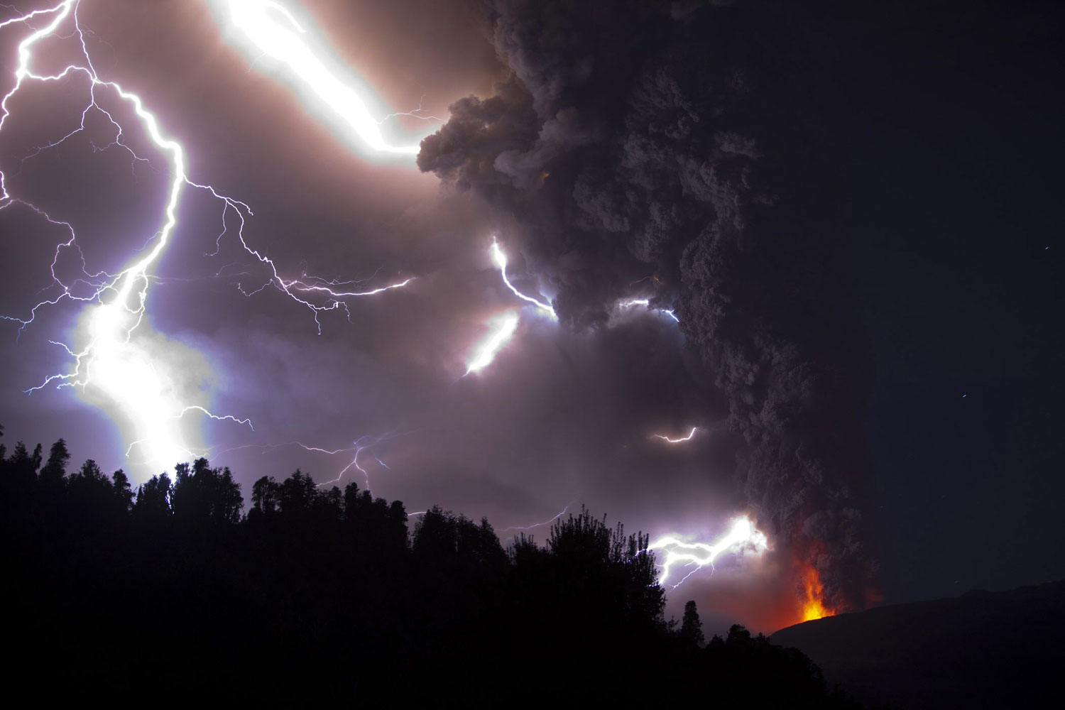 Ash billowing from Puyehue volcano as lightening strikes in southern Chile on June 5, 2011. 