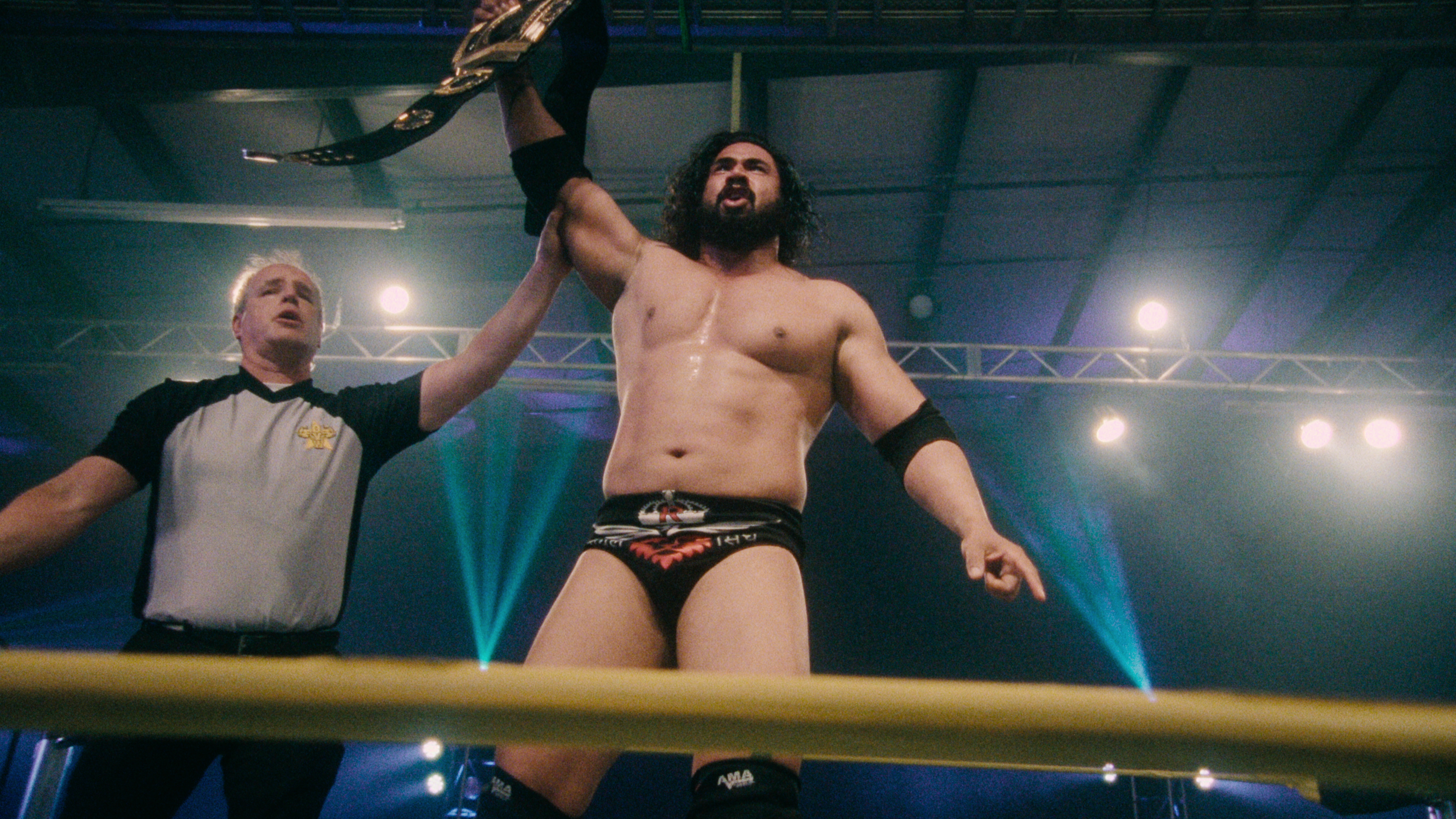Mahabali Shera, left, in <i>Wrestlers</i>