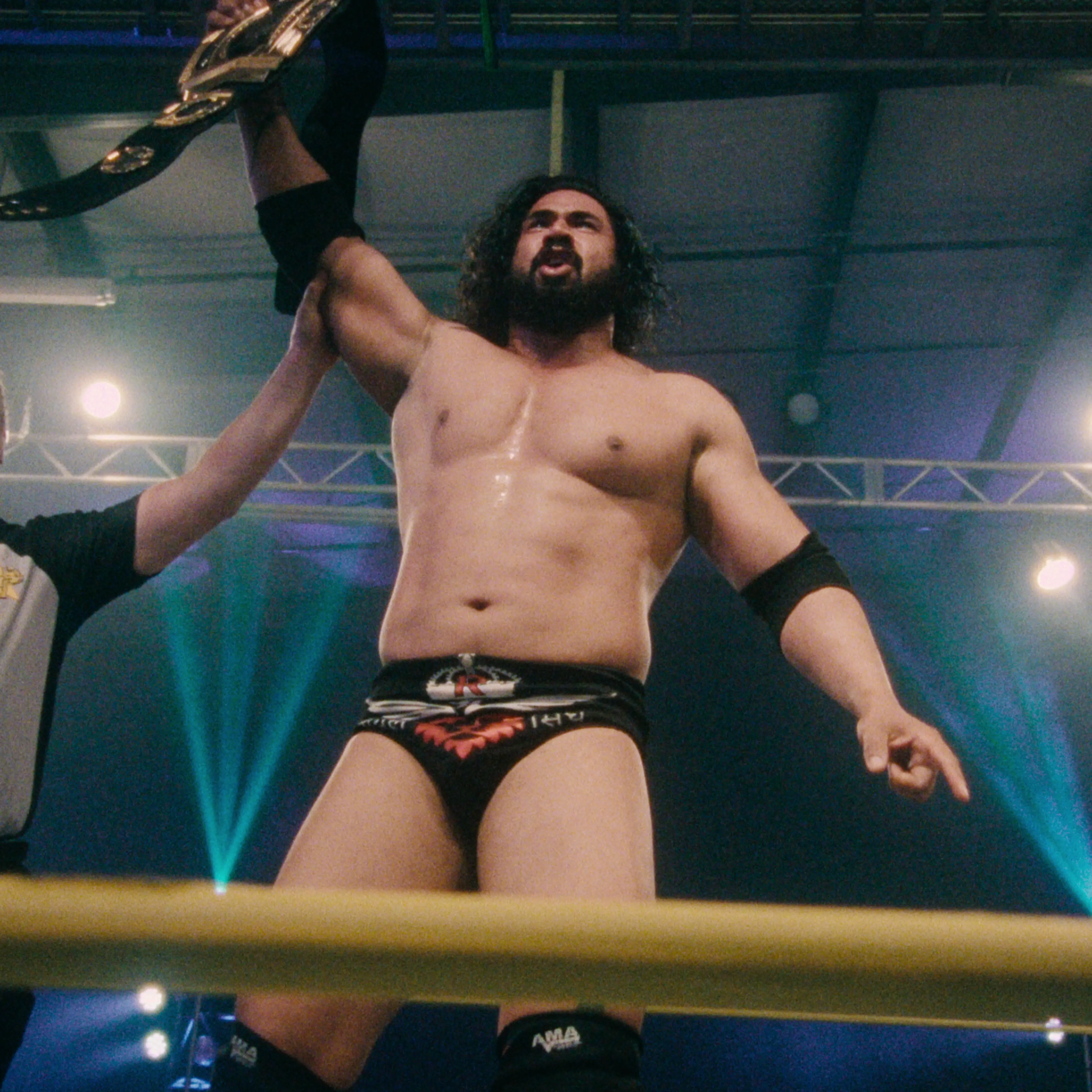Mahabali Shera, left, in <i>Wrestlers</i>