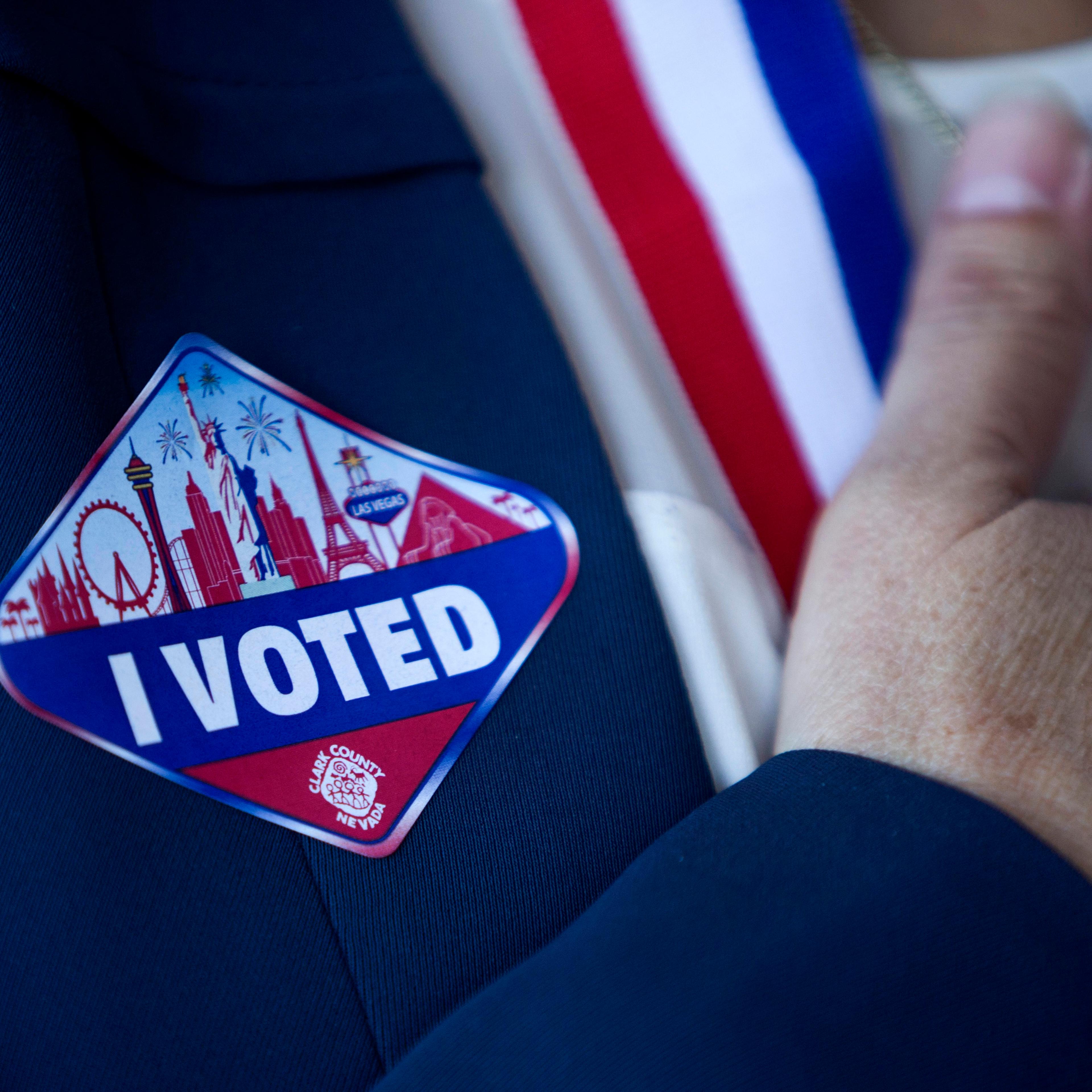 A voter wears a sticker after voting at an early voting site in Nevada on Nov. 2, 2016.