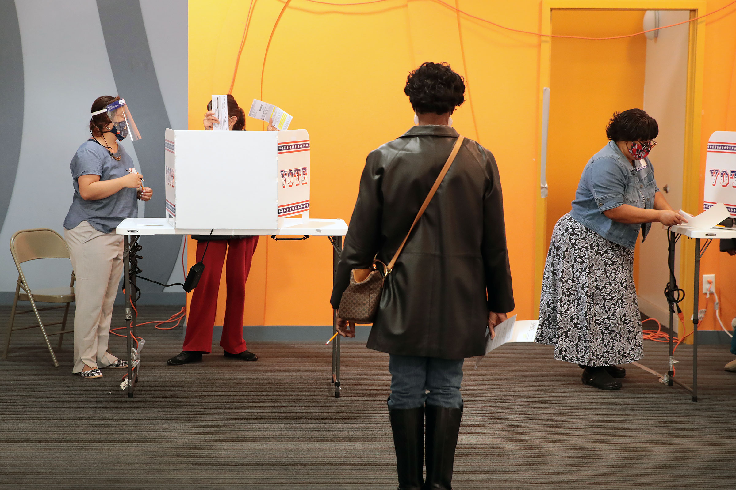 Residents vote at a polling place in the Midtown neighborhood in Milwaukee, Wisconsin on Oct. 20, 2020.