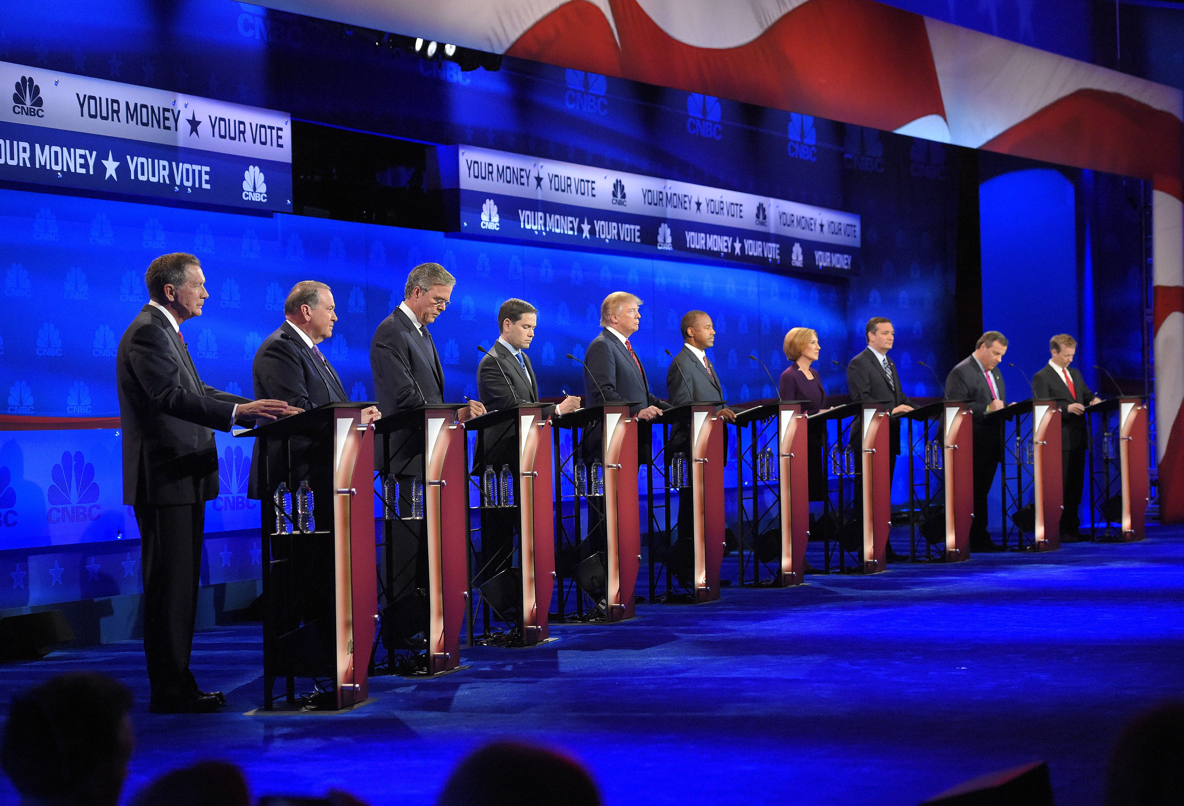 Republican presidential candidates, from left, John Kasich, Mike Huckabee, Jeb Bush, Marco Rubio, Donald Trump, Ben Carson, Carly Fiorina, Ted Cruz, Chris Christie, and Rand Paul take the stage during the CNBC Republican presidential debate at the Univer