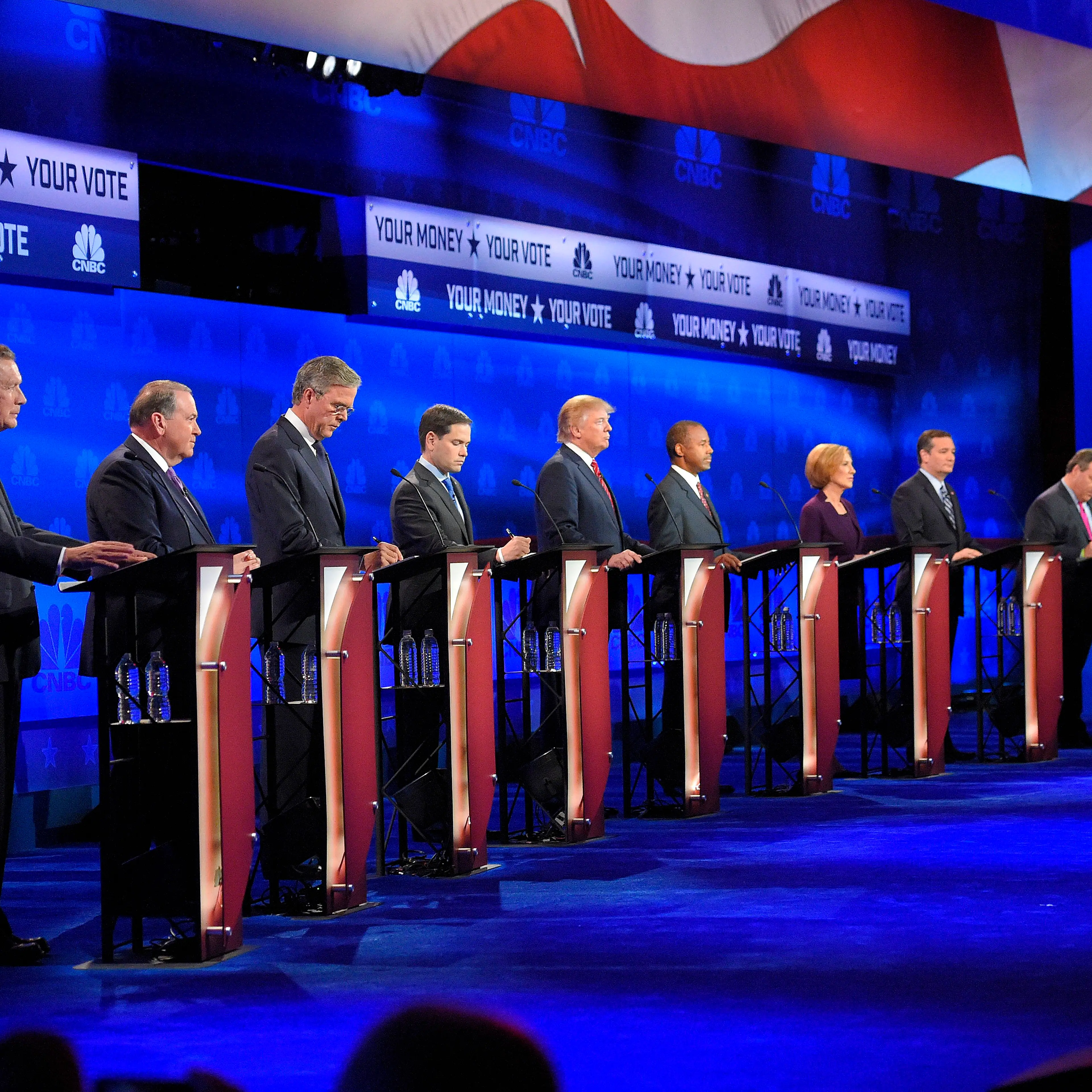 Republican presidential candidates, from left, John Kasich, Mike Huckabee, Jeb Bush, Marco Rubio, Donald Trump, Ben Carson, Carly Fiorina, Ted Cruz, Chris Christie, and Rand Paul take the stage during the CNBC Republican presidential debate at the Univer