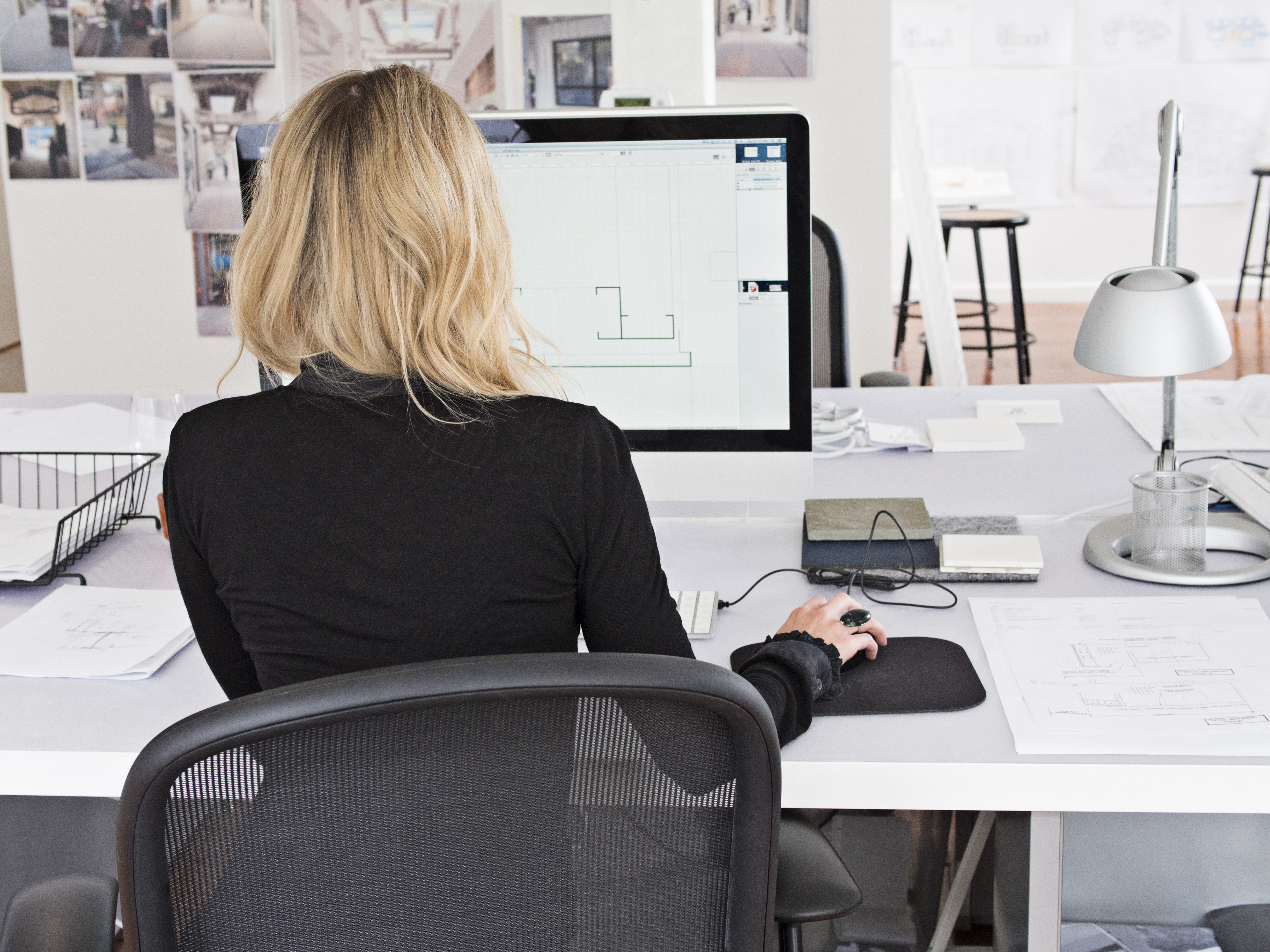 woman-working-computer-rear-view