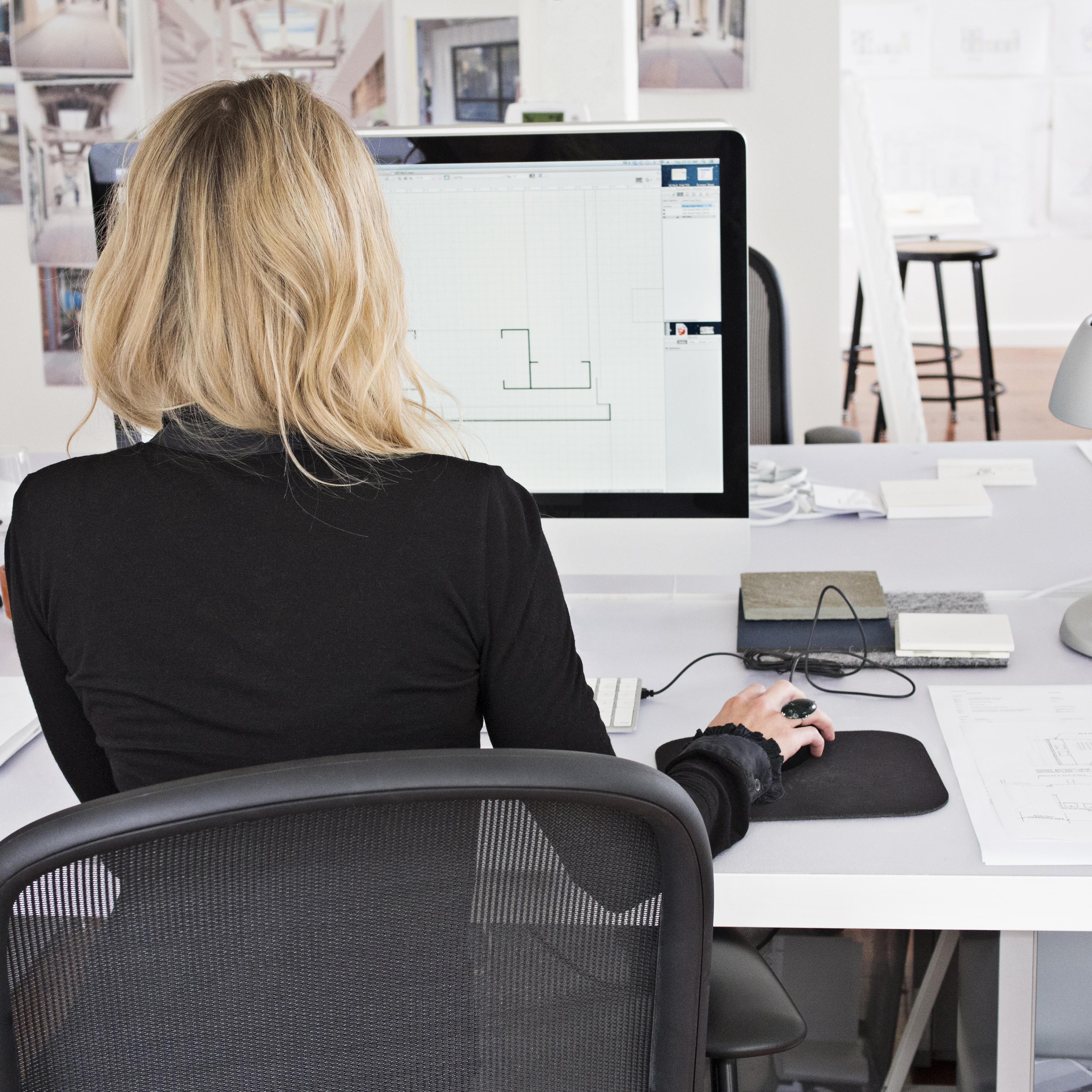 woman-working-computer-rear-view