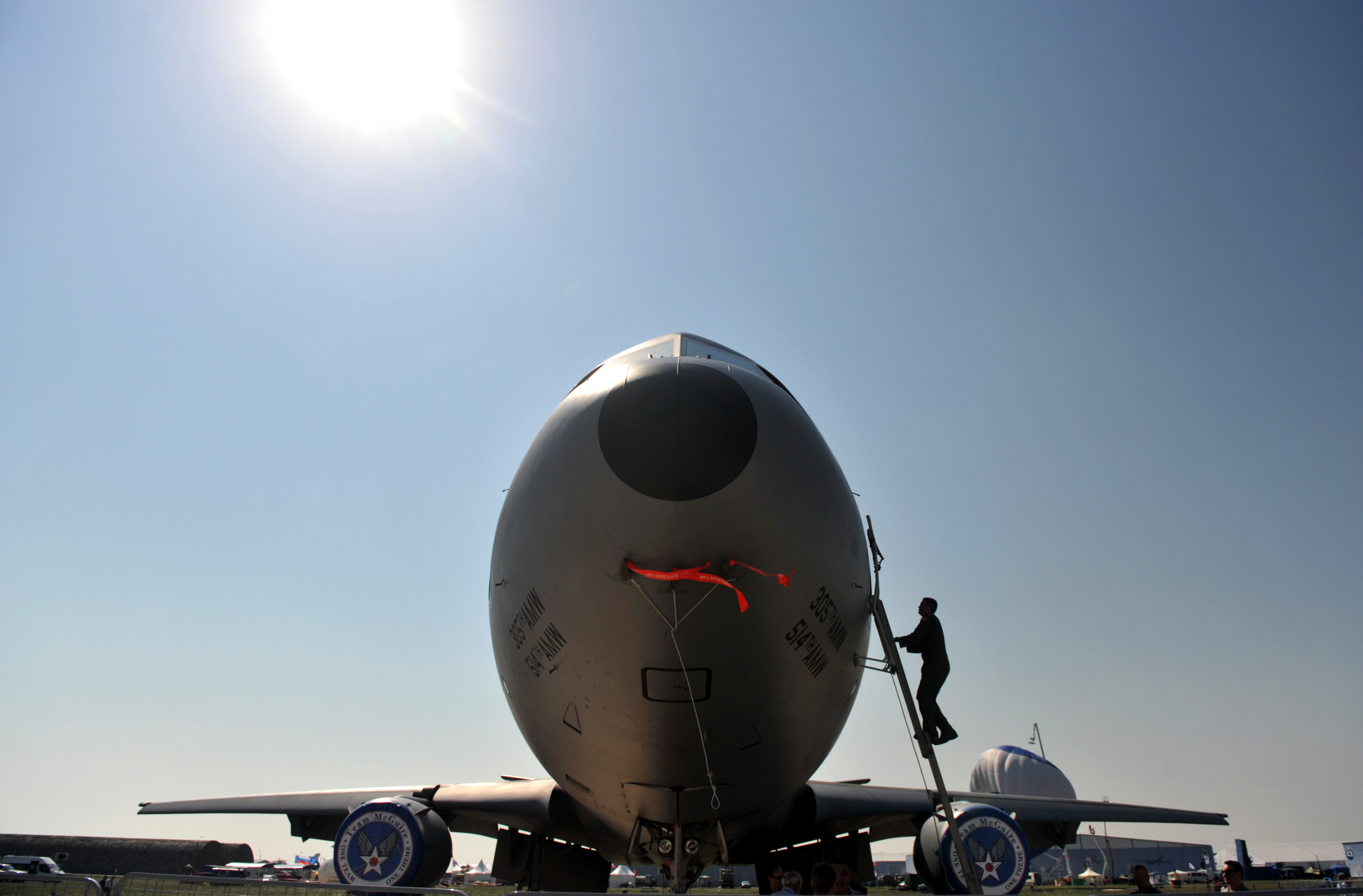 A US Air Force officer climbs onto his B