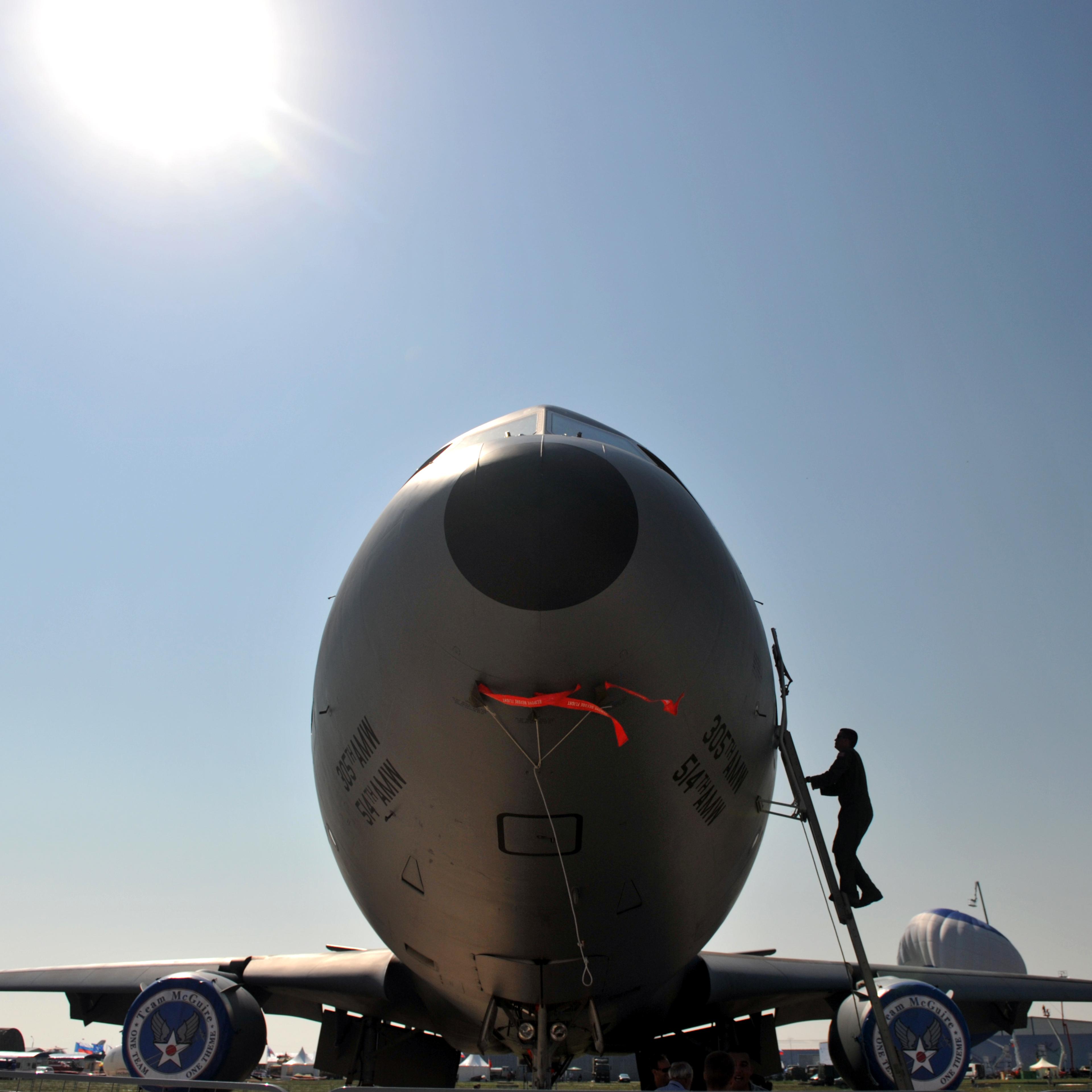 A US Air Force officer climbs onto his B