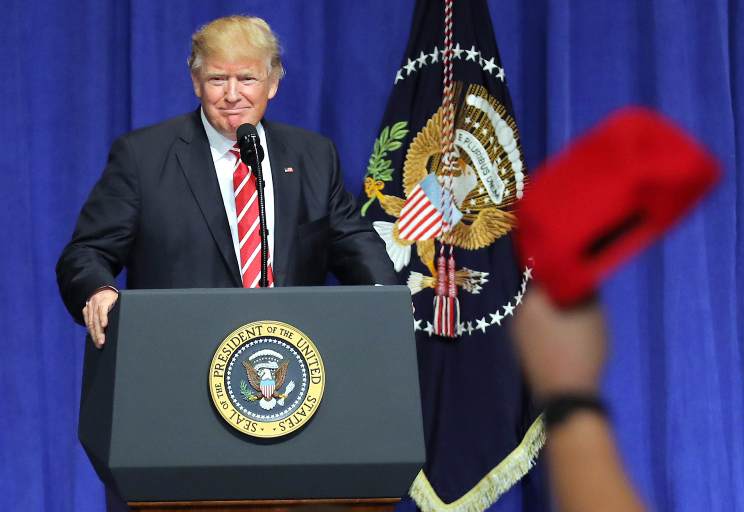 U.S. President Donald Trump is welcomed as he speaks to commanders and coalition representatives during a visit to U.S. Central Command and U.S. Special Operations Command at MacDill Air Force Base in Tampa, Florida, U.S., February 6, 2017. REUTERS/Carlo