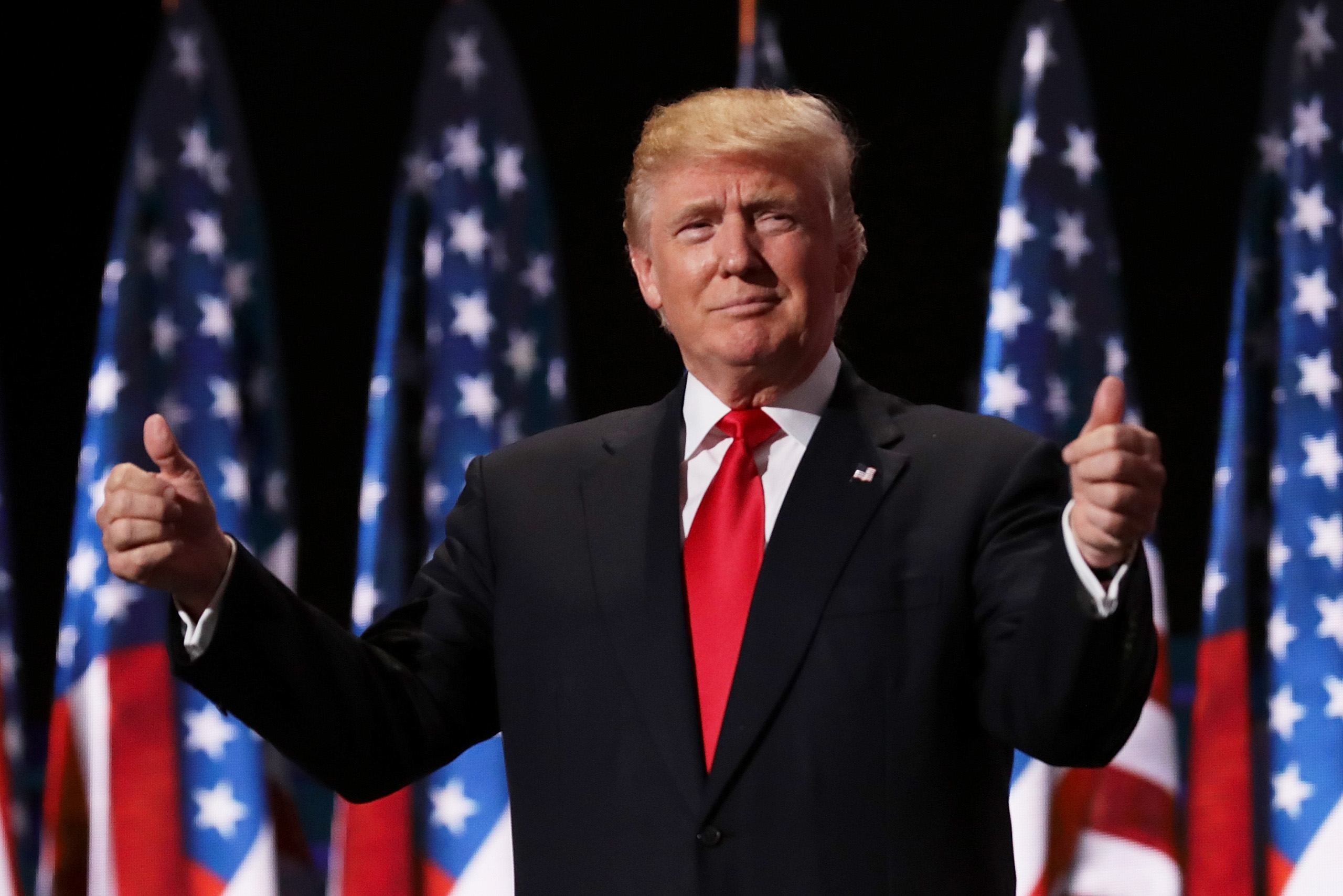 Donald Trump gives two thumbs up to the crowd during the evening session on the fourth day of the Republican National Convention on July 21, 2016.