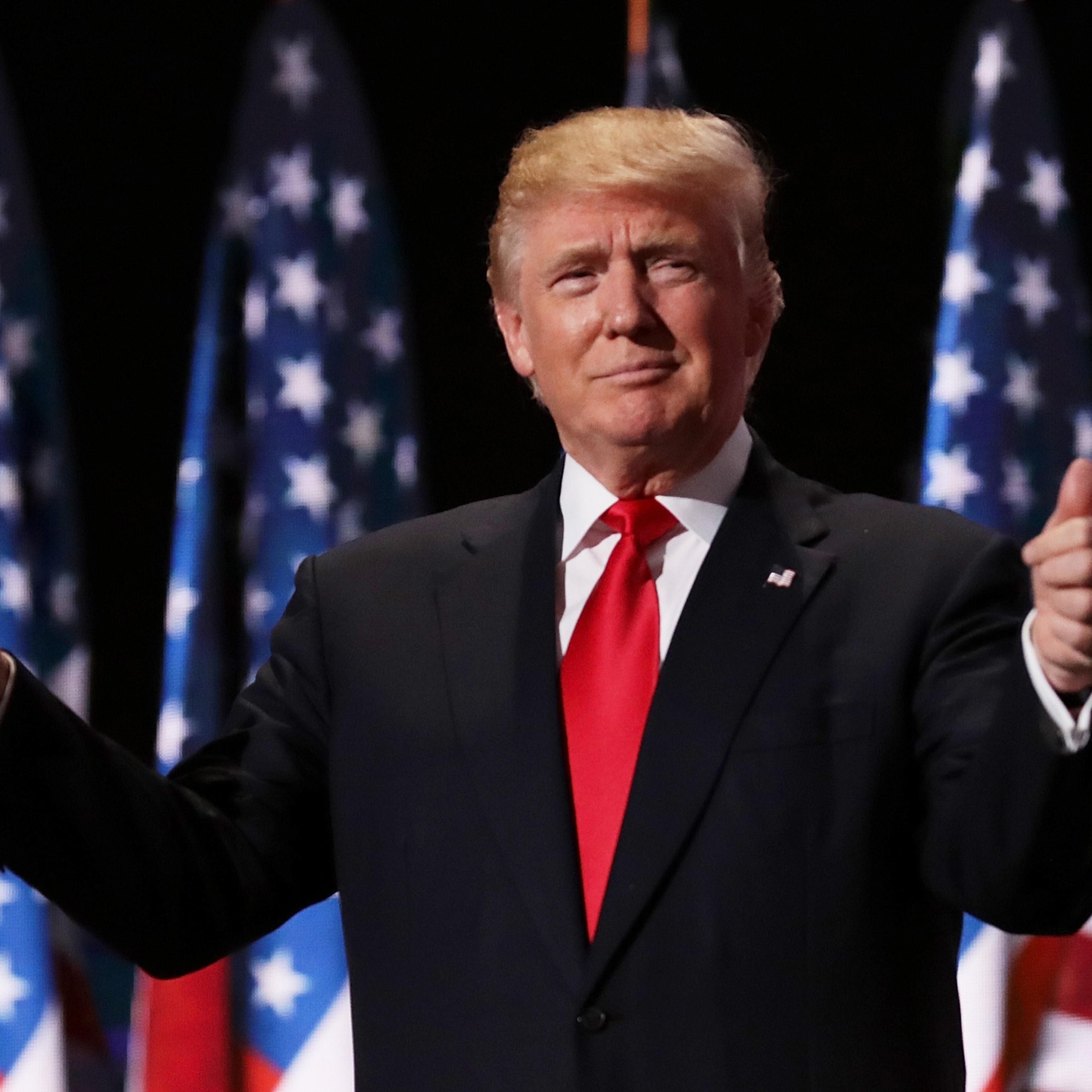 Donald Trump gives two thumbs up to the crowd during the evening session on the fourth day of the Republican National Convention on July 21, 2016.