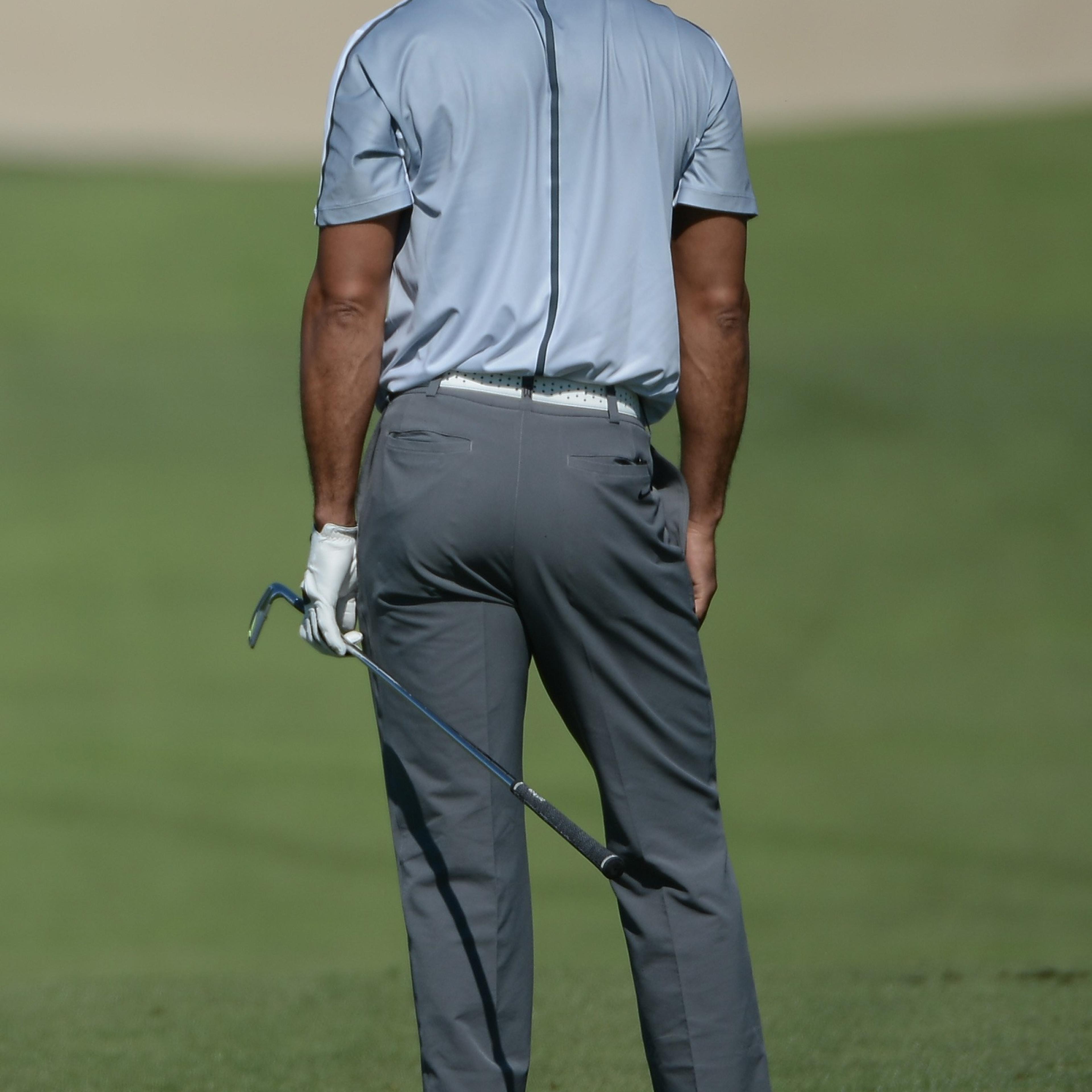Tiger Woods reacts after playing his shot from the 13th fairway on the north course during the first round of the Farmers Insurance Open at Torrey Pines Golf Course on Feb. 5, 2015 in La Jolla, California.