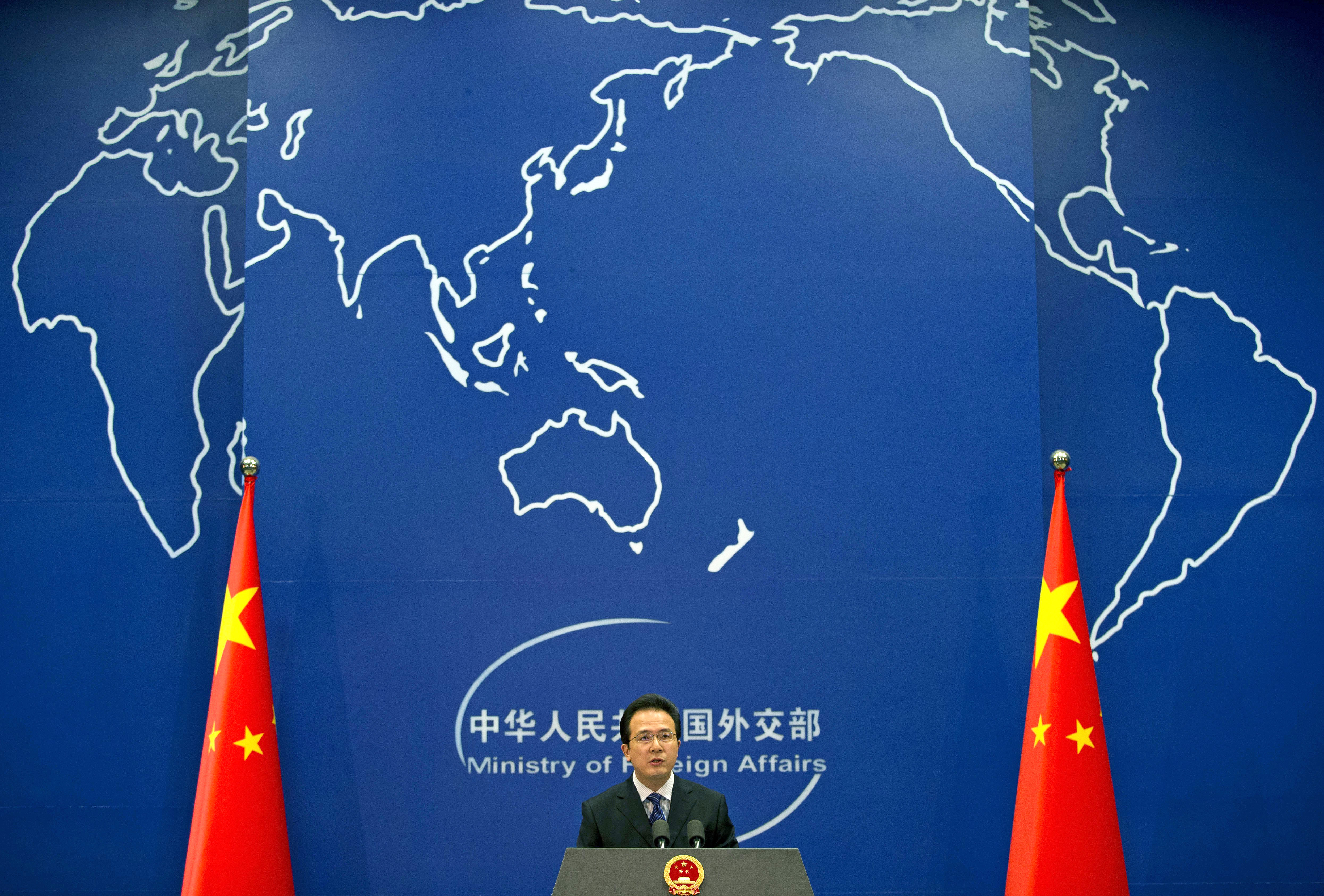Foreign Ministry spokesman Hong Lei speaks during a daily briefing at the Ministry of Foreign Affairs office in Beijing on May 20, 2014.