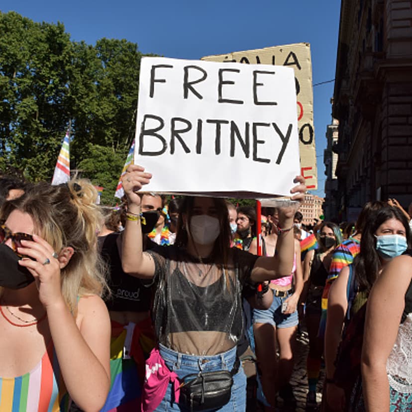 Person with a "Free Britney" sign takes part in the Rome Pride parade in Rome, Italy, on June 26, 2021.