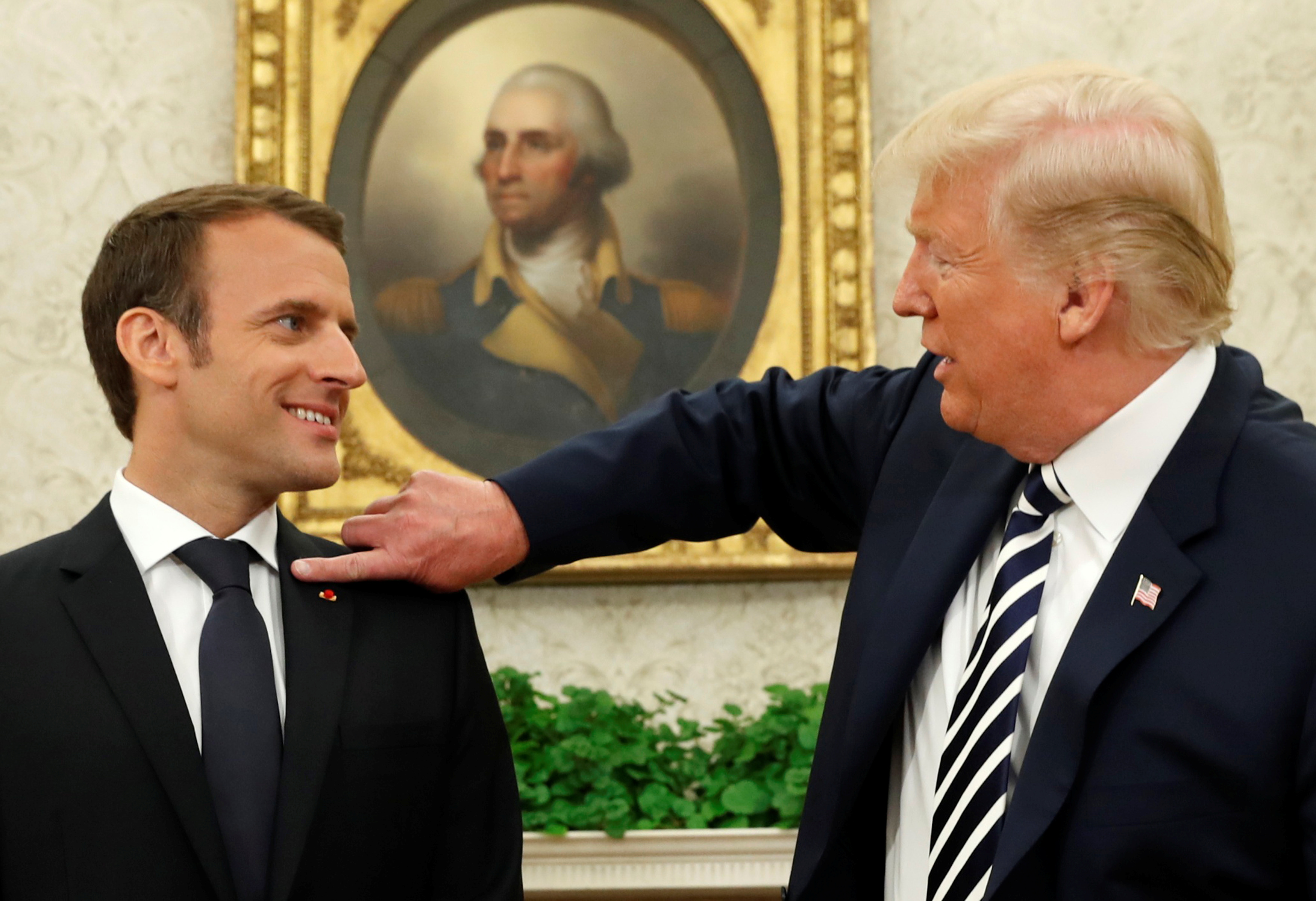U.S. President Trump meets with French President Macron at the Oval Office at the White House in Washington